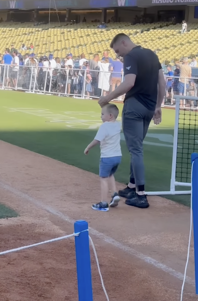 Maximus Freeman learning to walk again with Freddie Freeman's support in a post uploaded on September 26, 2024 | Source: Instagram/chelseafreeman5 | freddiefreeman