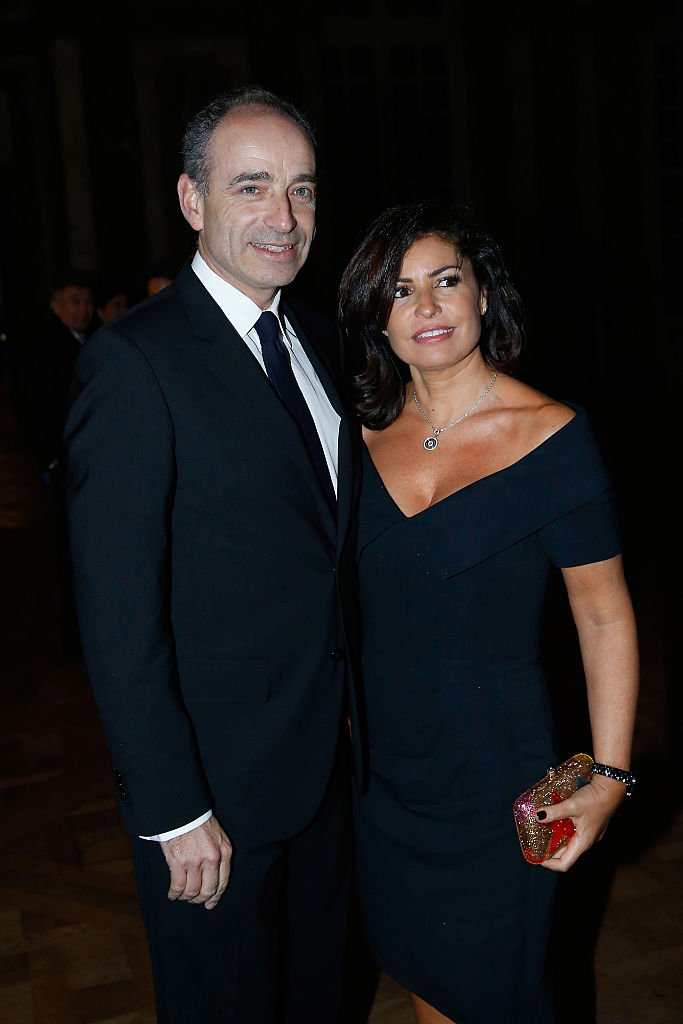 Jean-François Copé et Nadia d'Alincourt assistent au dîner de gala "France-USA" au Château de Versailles le 5 décembre 2015 à Versailles, France.  | Photo : Getty Image
