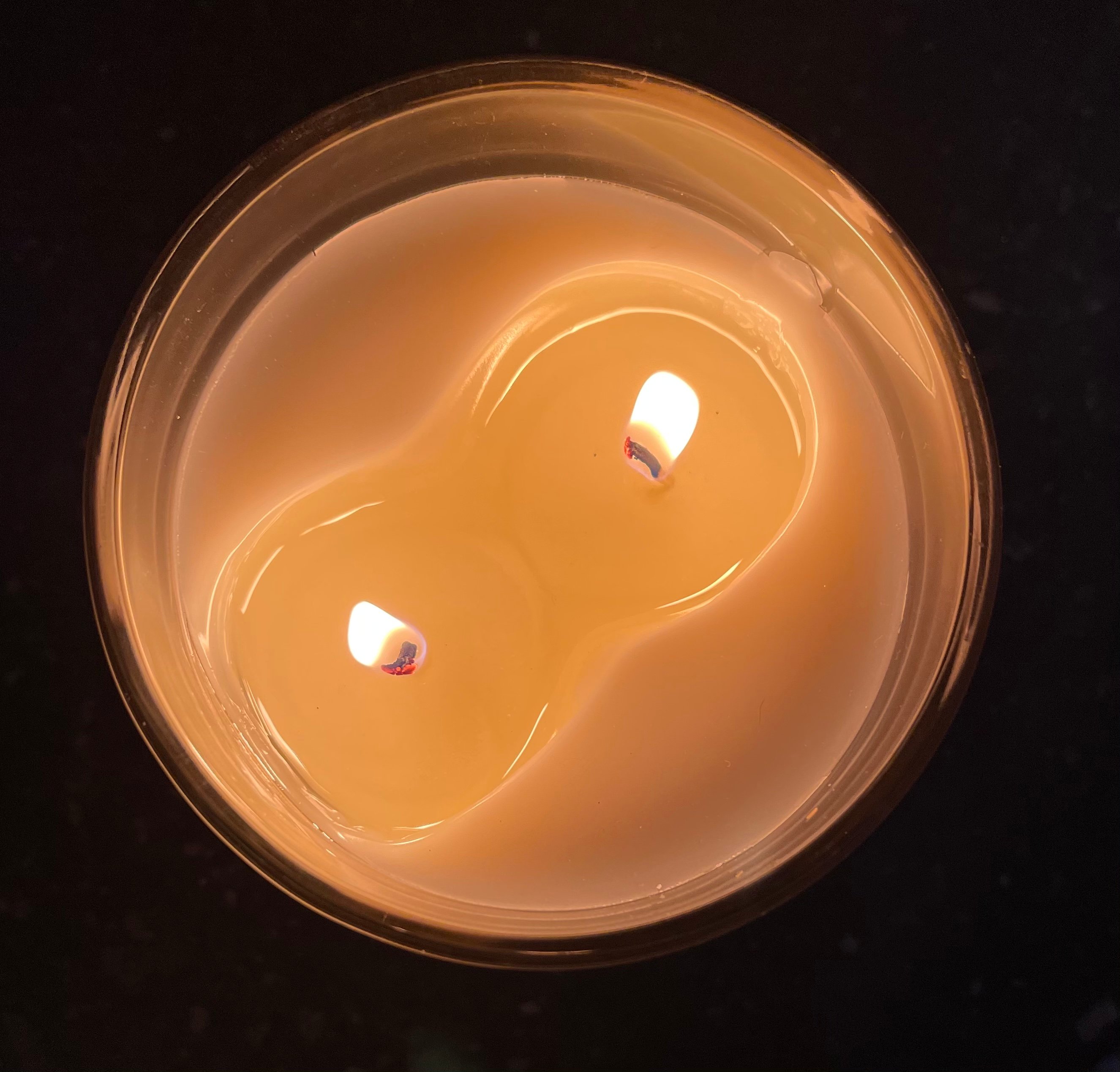 A burning twin-flame candle | Source: Shutterstock