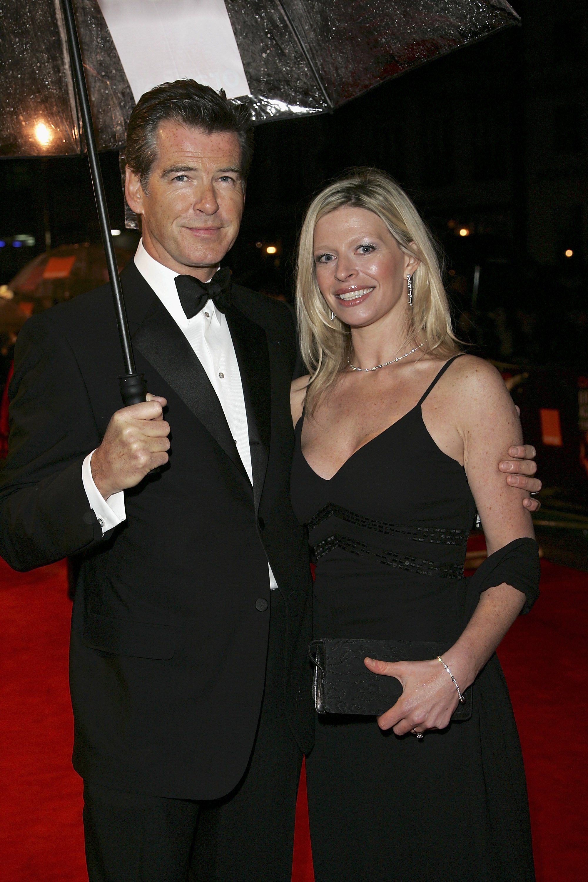 Pierce Brosnan and Charlotte at The Orange British Academy Film Awards (BAFTAs) on February 19, 2006, in London | Source: Getty Images