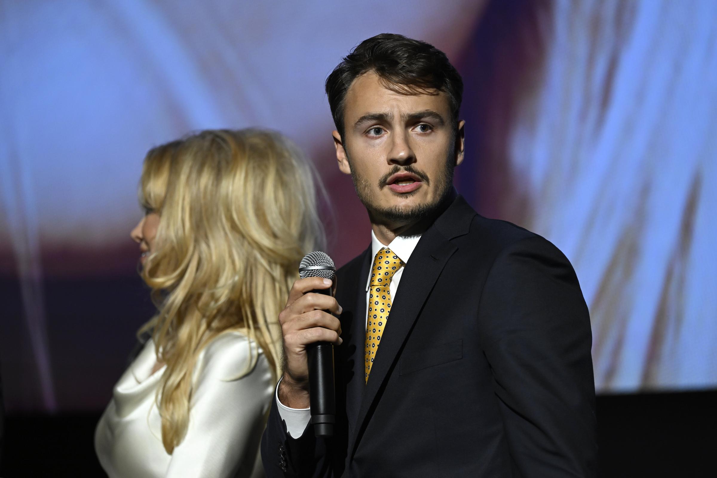 Brandon Thomas Lee speaks beside his mother Pamela Anderson at the "Pamela, A Love Story" Special Screening in New York City on February 1, 2023 | Source: Getty Images