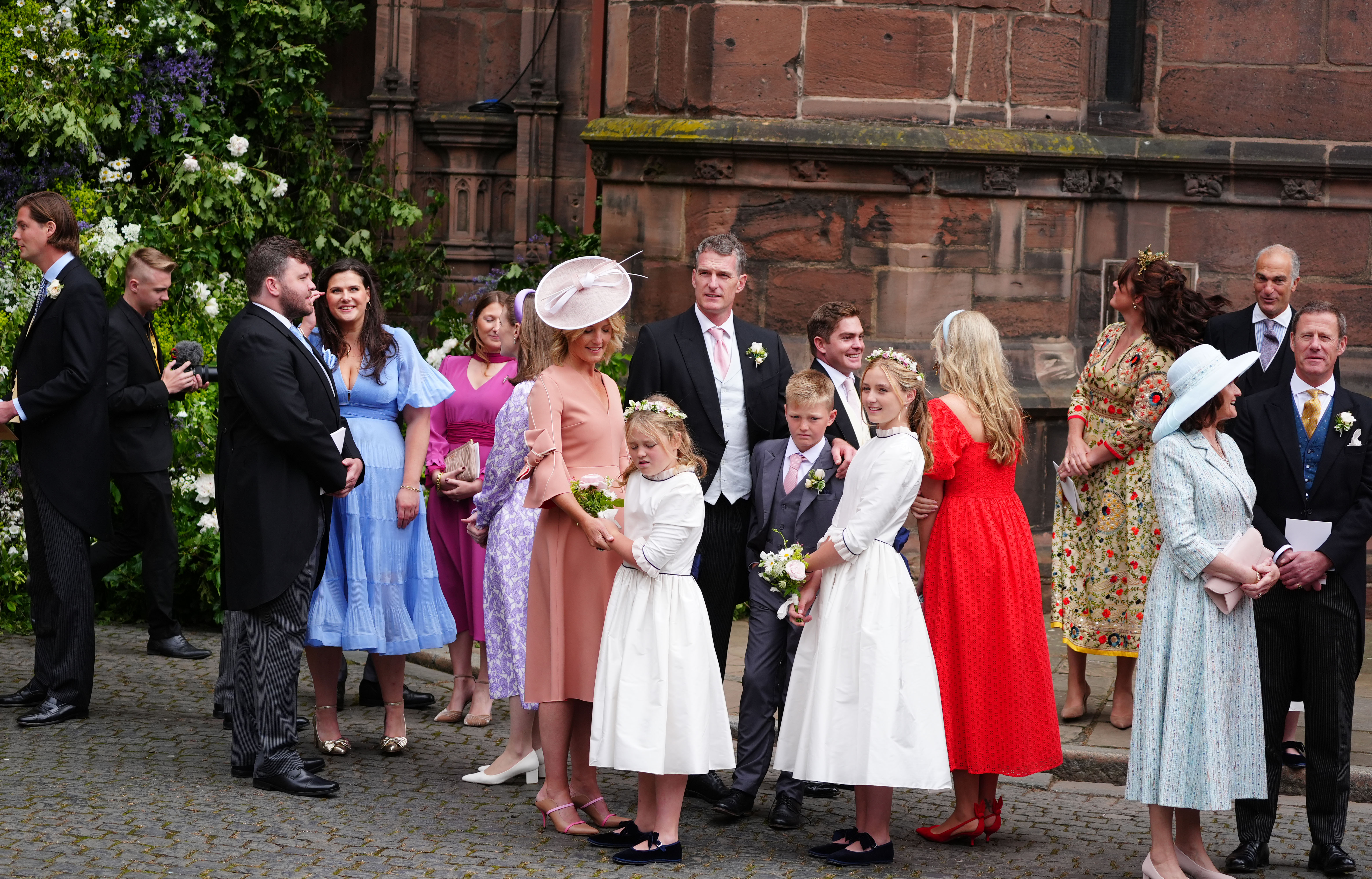 Guests leave Chester Cathedral after the wedding of Olivia Henson and Hugh Grosvenor, the Duke of Westminster on June 7, 2024 | Source: Getty Images