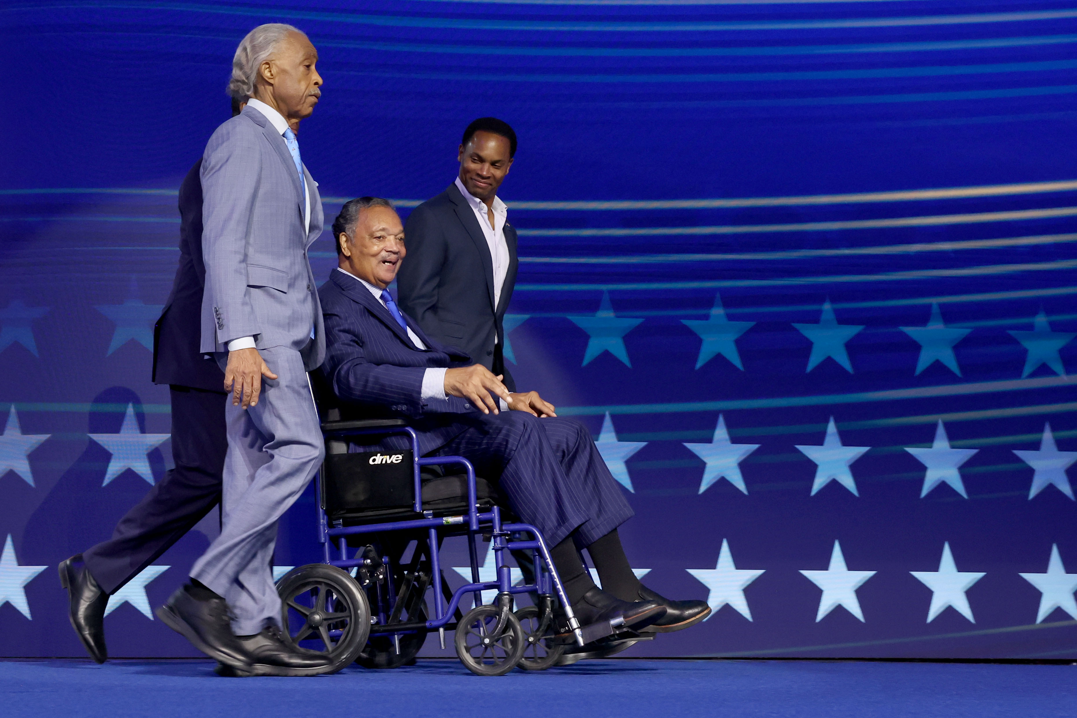Rev. Jesse Jackson is wheeled onto the stage during the Democratic National Convention at the United Center in Chicago on August 19, 2024 | Source: Getty Images