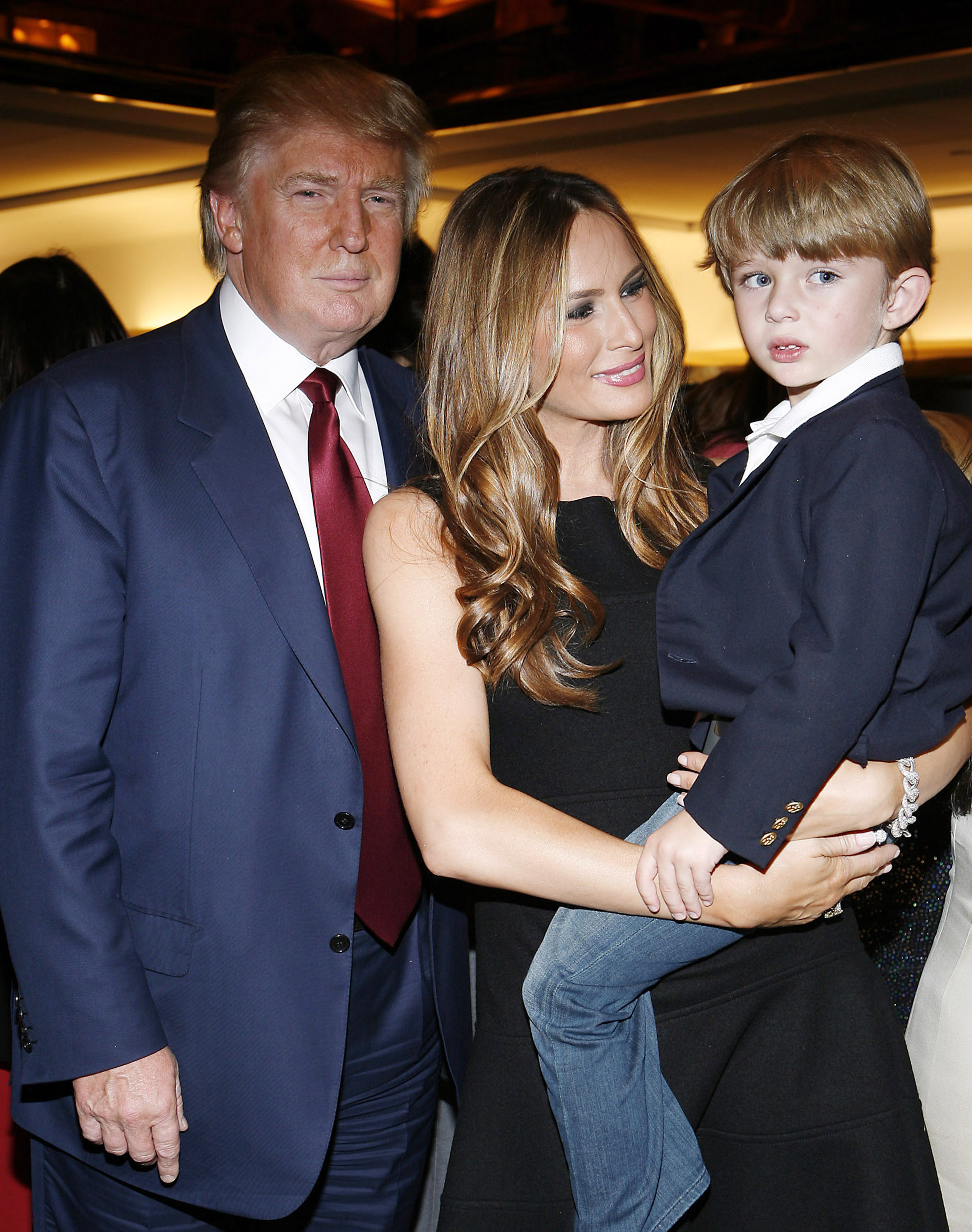 Donald, Melania, and Barron Trump at "The Trump Card: Playing to Win in Work and Life" book launch on October 14, 2009, in New York. | Source: Getty Images