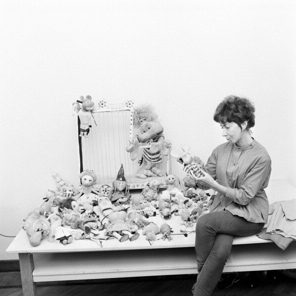 Italian animation artist Maria Perego, inventor of Topo Gigio, looking at a model of the famous puppet. 1960s | Photo: Getty Images