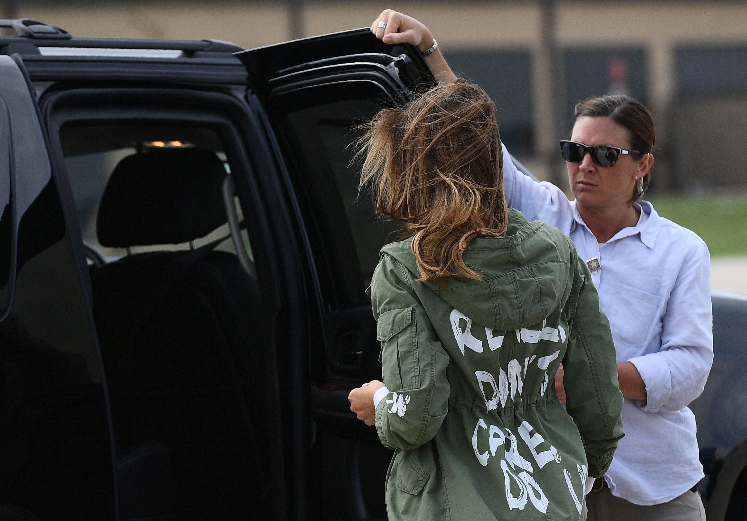 Melania Trump departs Andrews Air Rorce Base in Maryland June 21, 2018 wearing a jacket emblazoned with the words "I really don't care, Do U?" following her surprise visit with child migrants on the US-Mexico border | Source: Getty Images