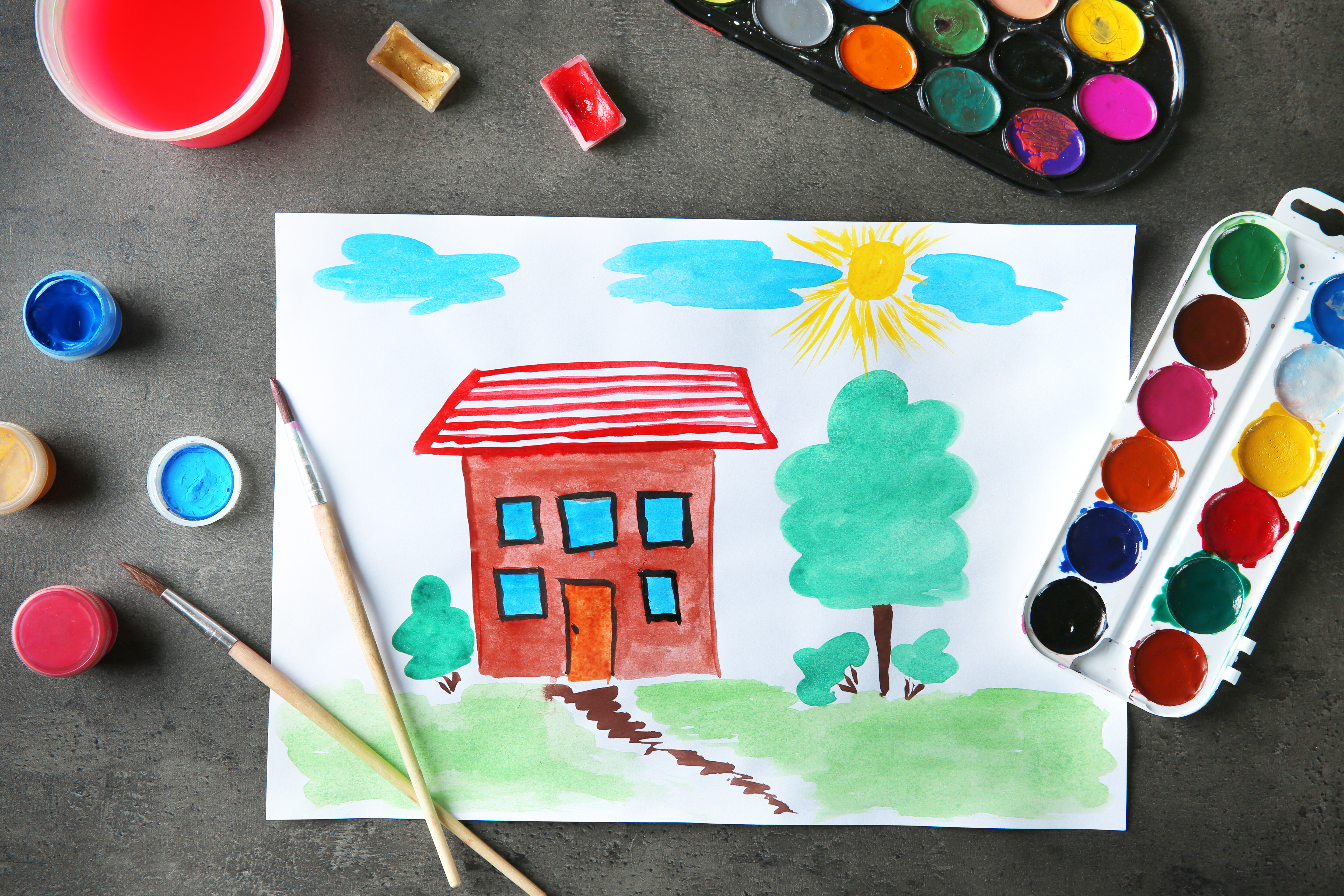 Child's painting of house | Source: Shutterstock