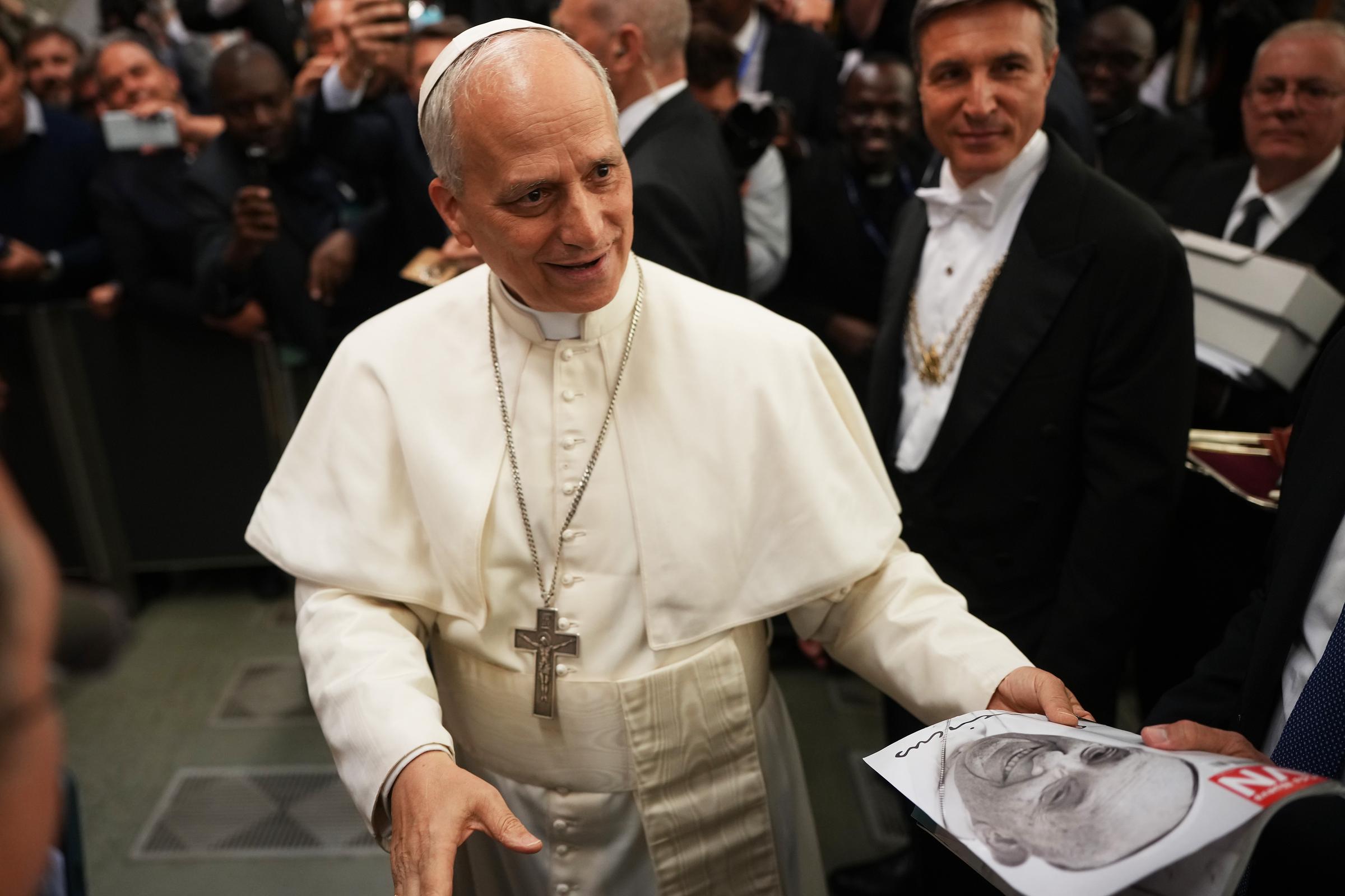 Pope Leo XIV arrives for an audience with thousands of journalists and media workers on May 12, 2025, at Paul VI Hall in Vatican City | Source: Getty Images