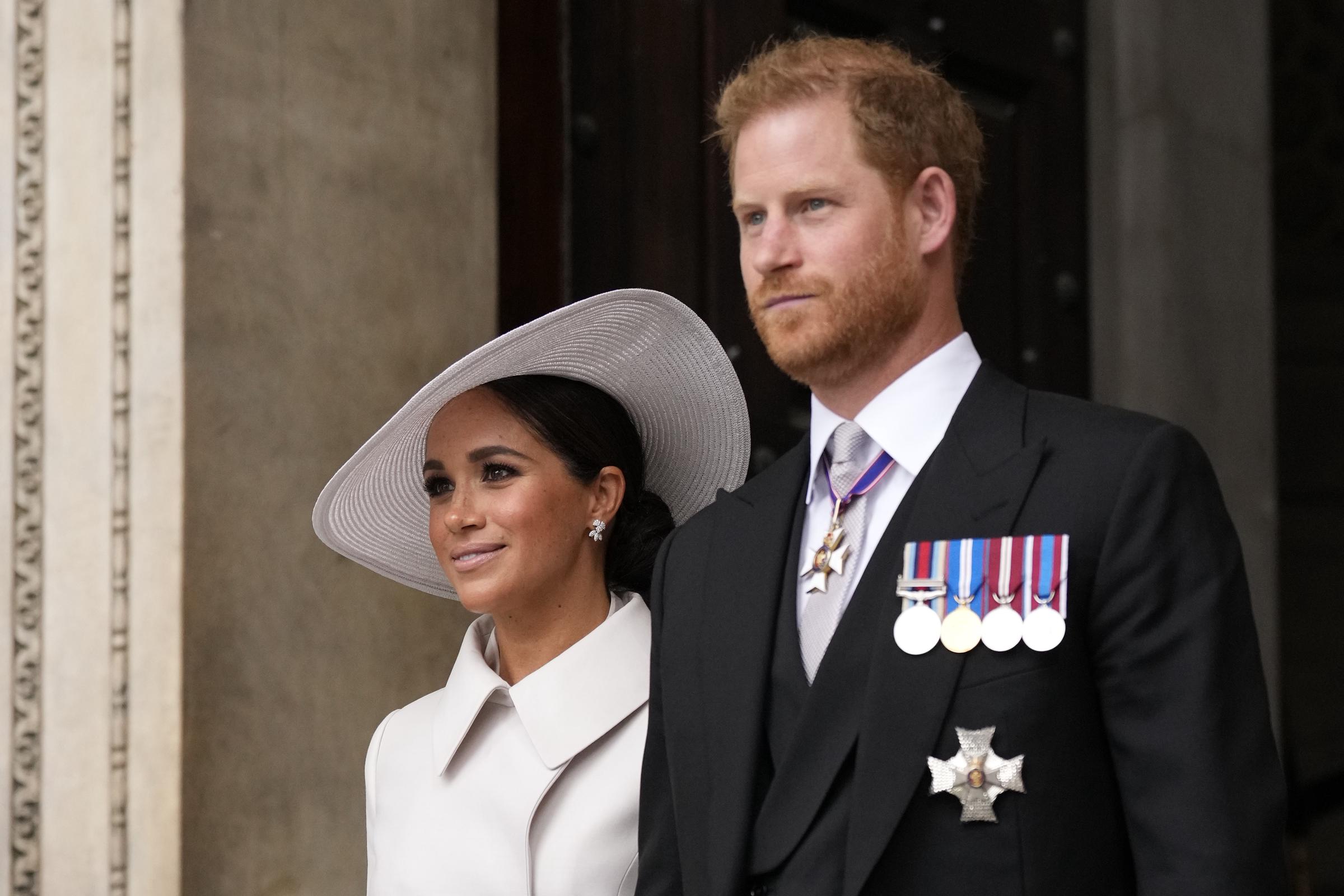 Meghan Markle and Prince Harry at leaving a National Service of Thanksgiving to mark the Platinum Jubilee in London, England on June 3, 2022 | Source: Getty Images