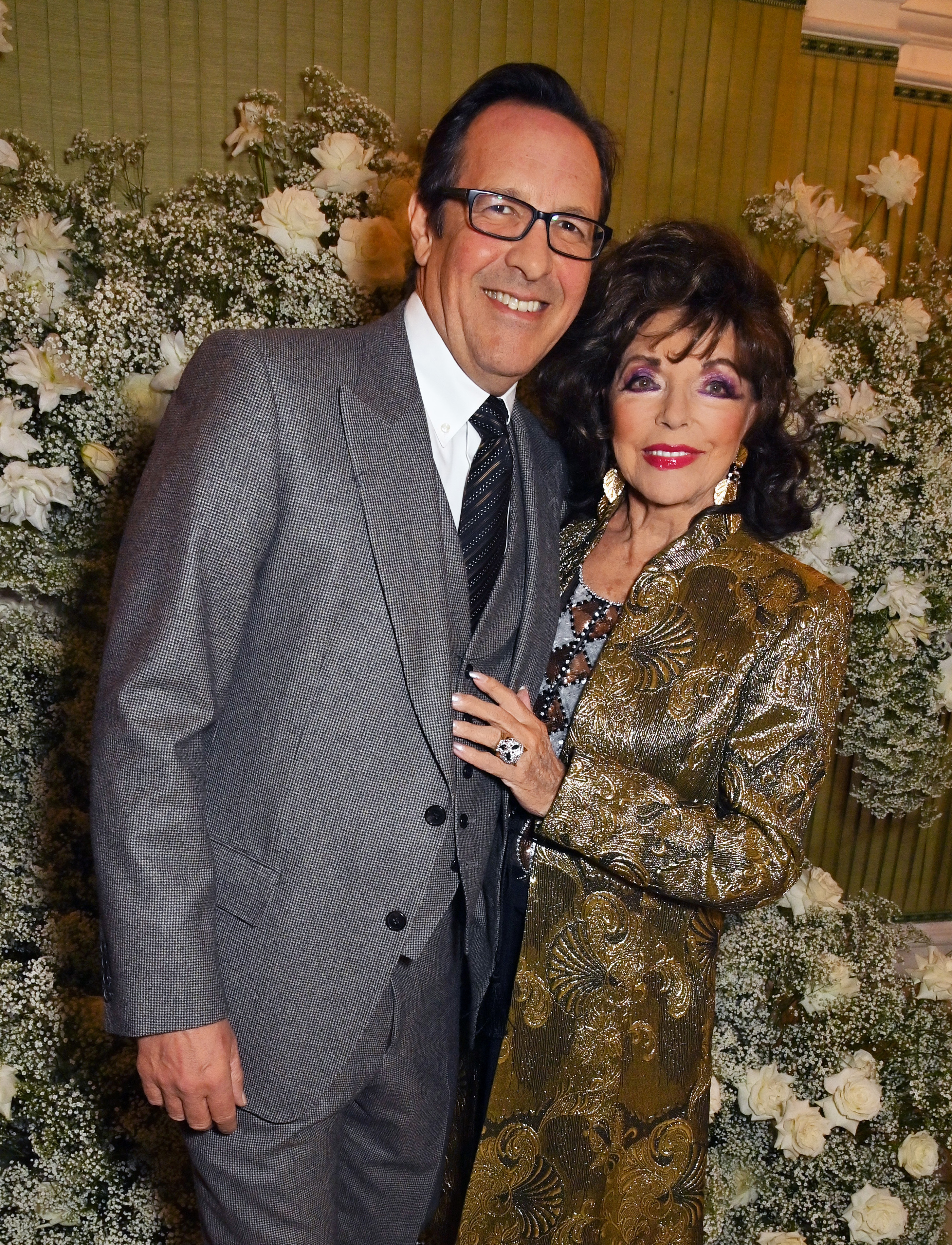 Percy Gibson and Joan Collins at the British Vogue And Tiffany & Co. Celebrate Fashion And Film Party 2023 on February 19, 2023 in London, England | Source: Getty Images