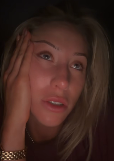 The woman looks up at the camera, from a post dated January 21, 2026. | Source: TikTok/alixearle