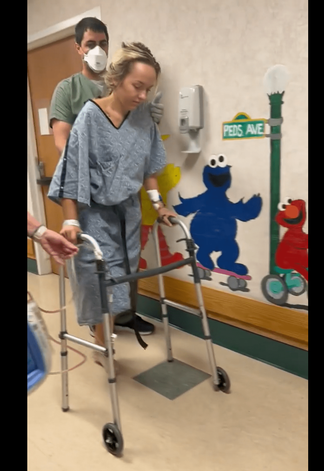 Addison Bethea is pictured taking her first steps with the help of a walker. | Source: facebook.com/Fight-Like-Addison