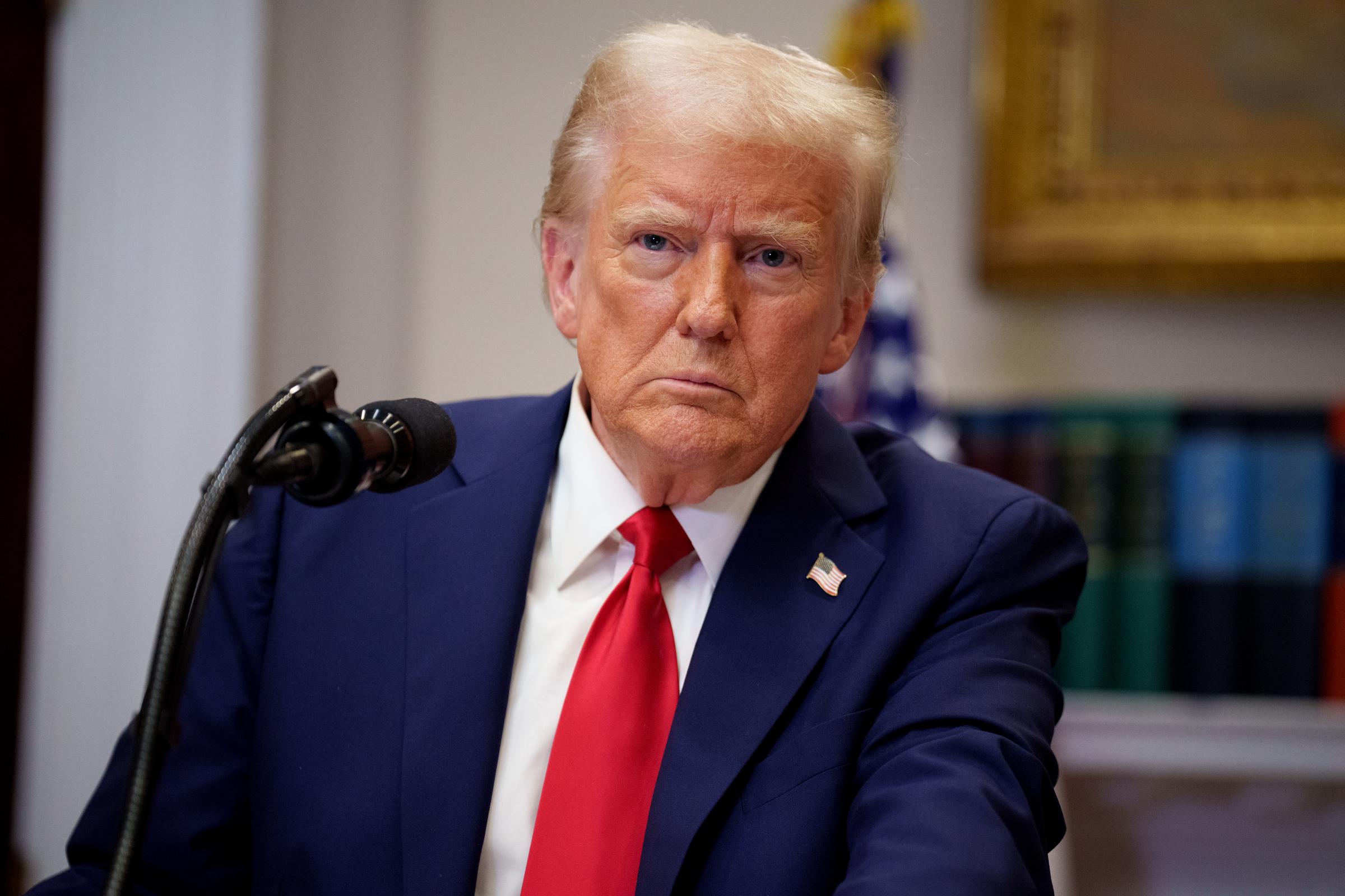 President Donald Trump taking a question from a reporter during a news conference in Washington, D.C., on January 21, 2025 | Source: Getty Images