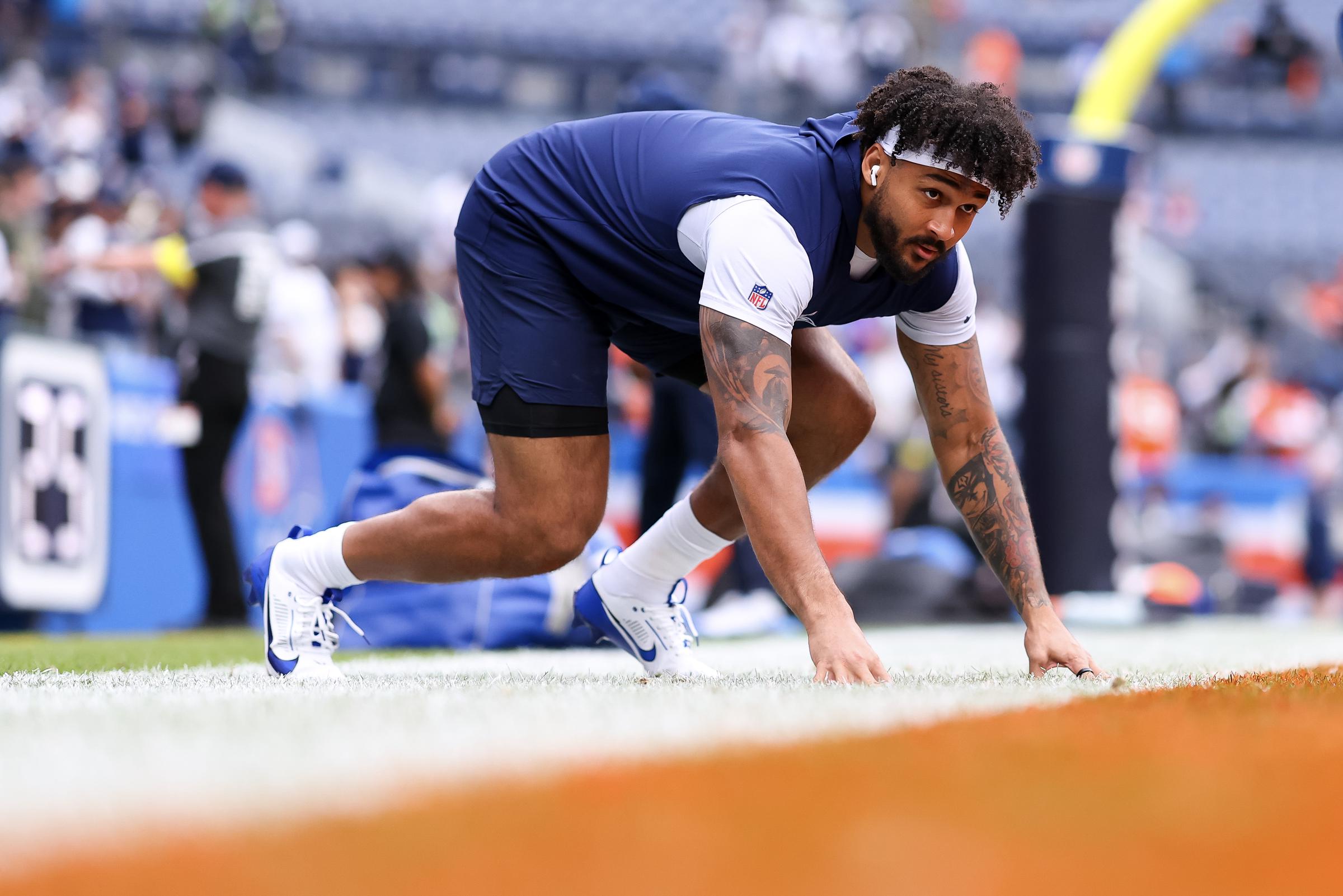 Marshawn Kneeland warms up before a football game at Empower Field on October 26, 2025, in Denver, Colorado | Source: Getty Images