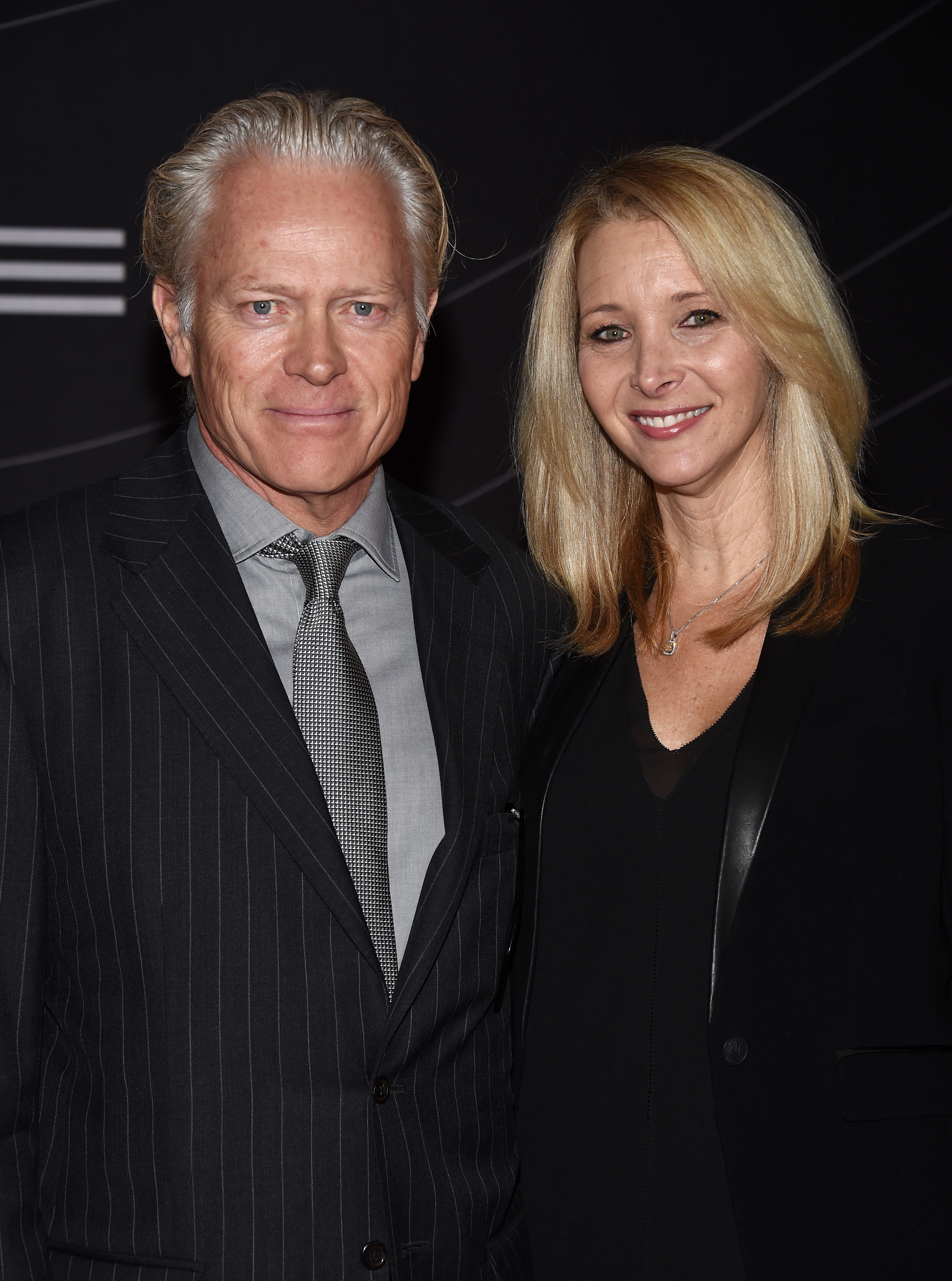 Lisa Kudrow and her husband Michel Stern at the Petersen Automotive Museum grand re-opening in Los Angeles, California on December 5, 2015 | Source: Getty Images