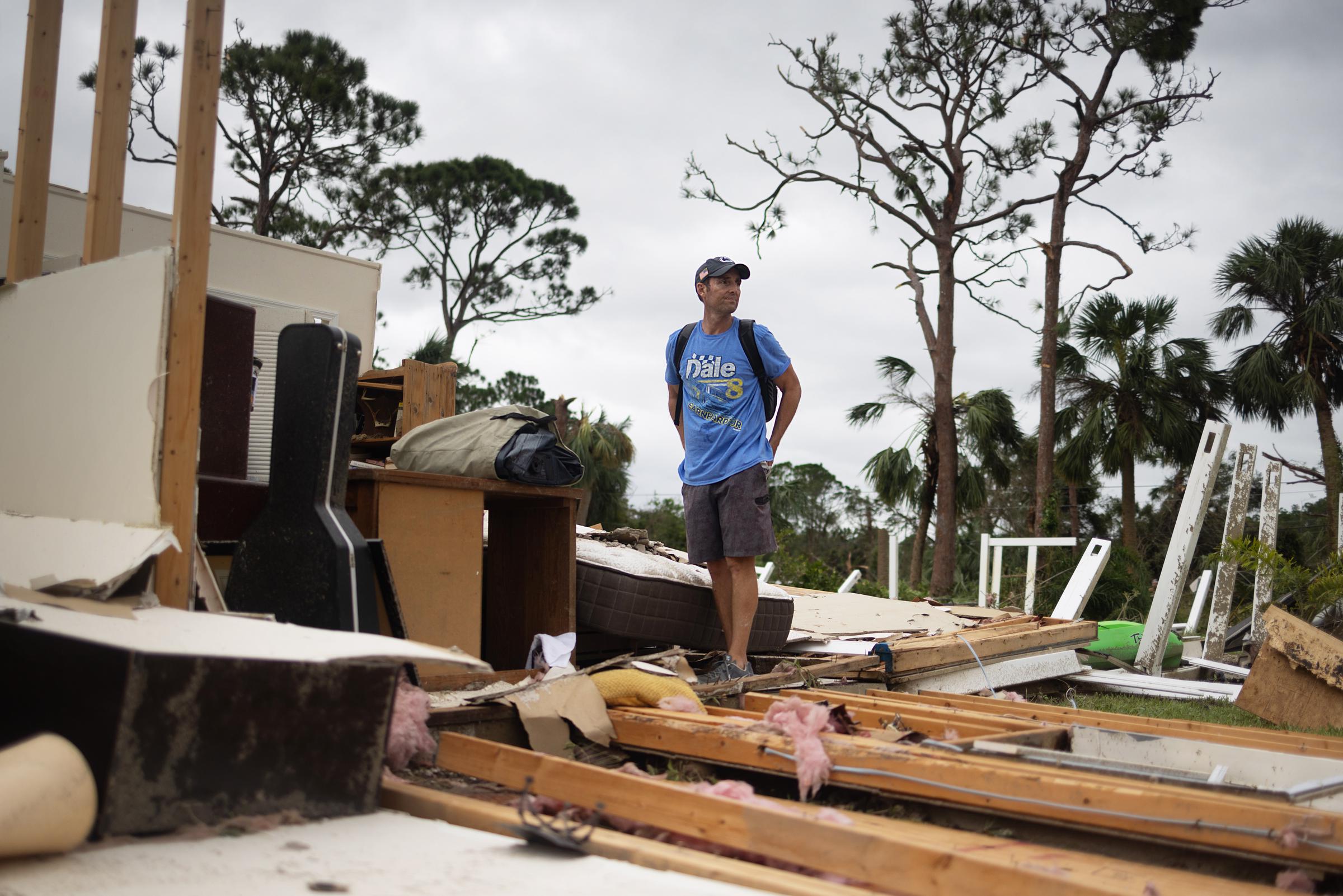 Floridian Shane Ostrander looking at what's left of his home after Hurricane Milton in Fort Pierce, Florida on October 10, 2024 | Source: Getty Images