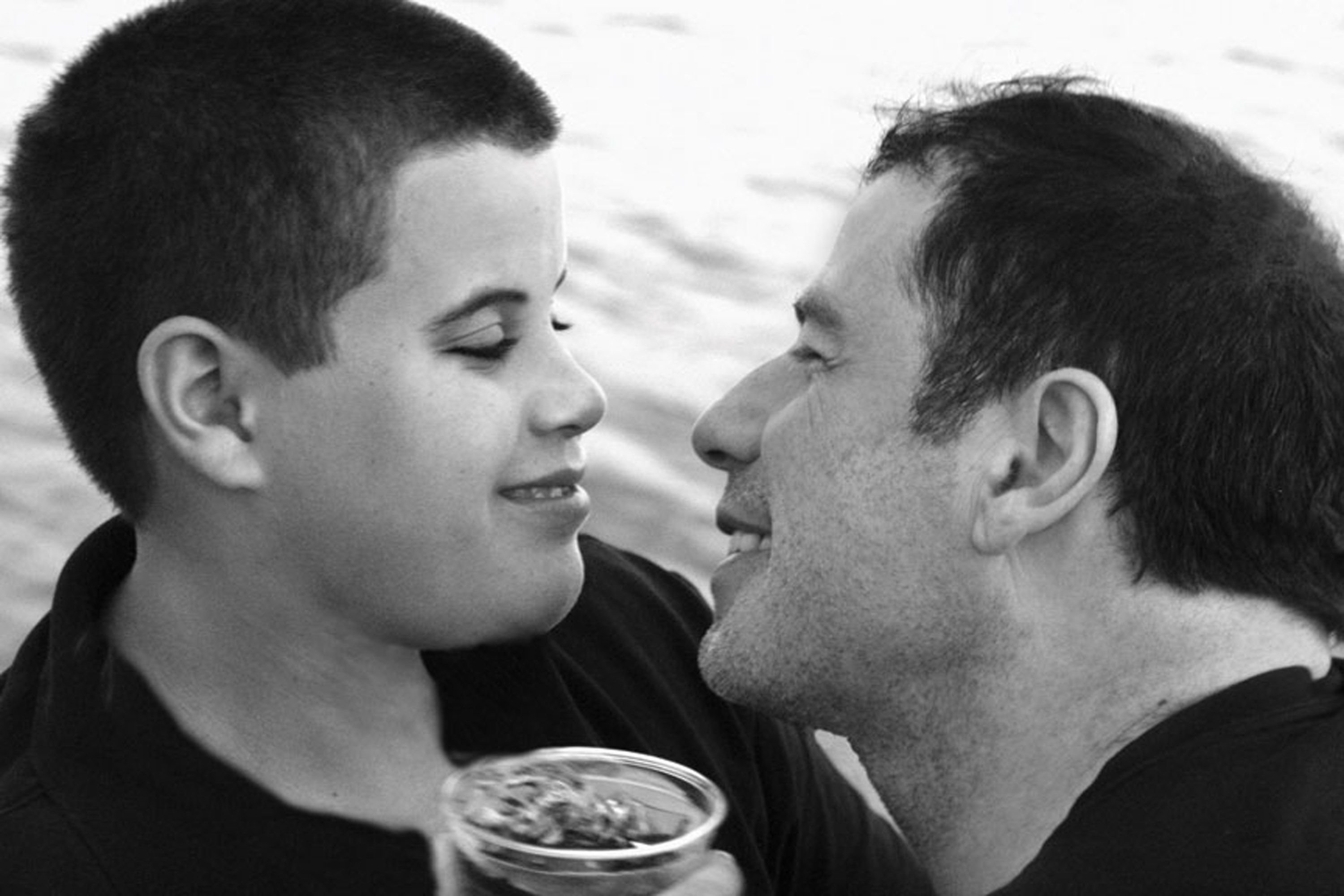 Jett Travolta (L) is seen with his father, actor John Travolta in this undated picture | Source: Getty Images