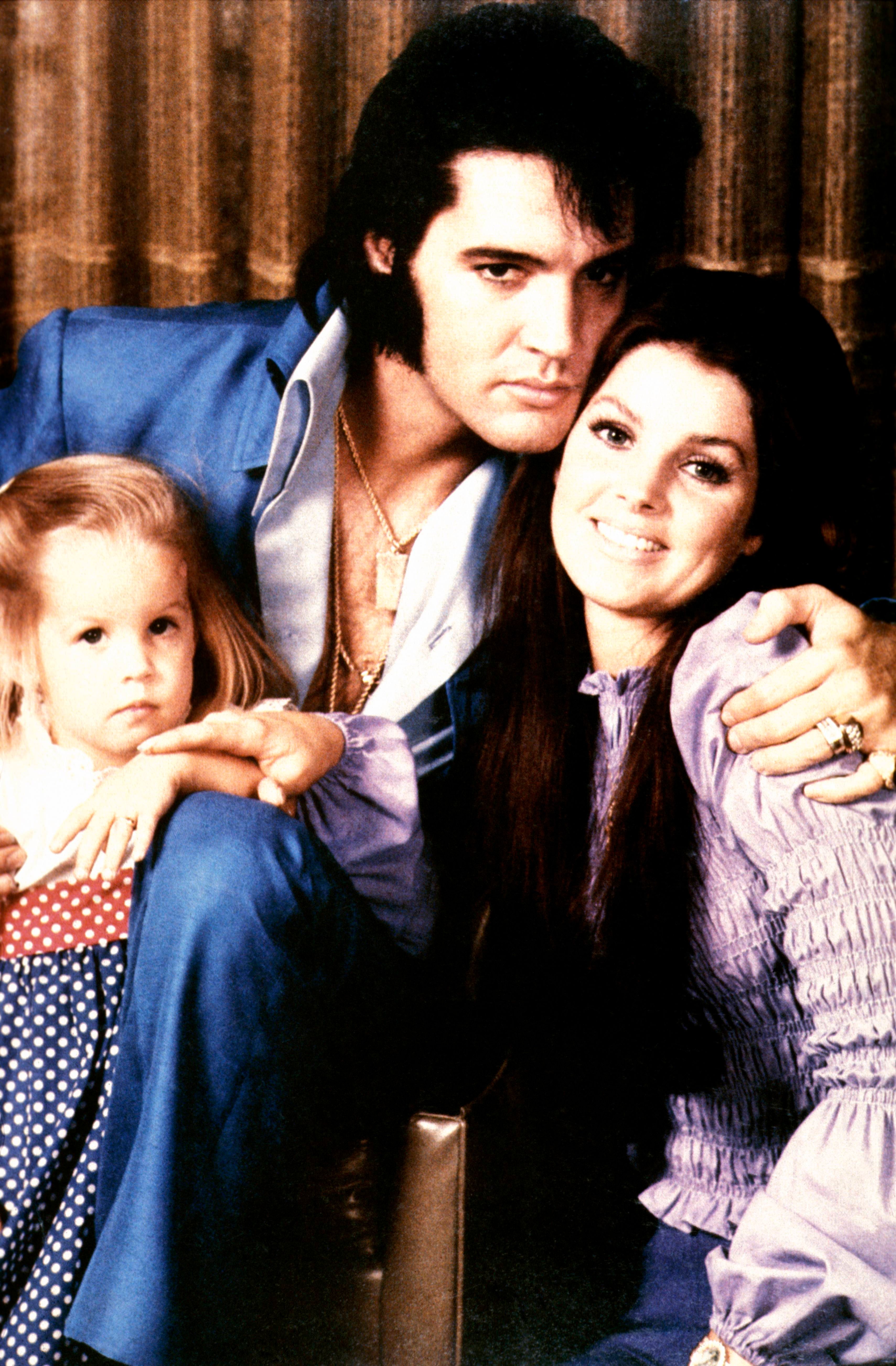 Lisa-Marie, Elvis, and Priscilla Presley, circa1970. | Source: GAB Archive/Redferns/Getty Images