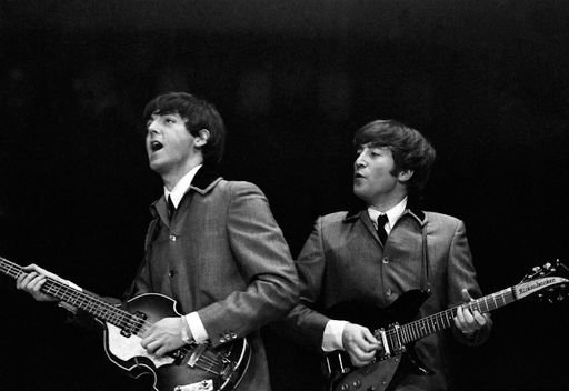 McCartney and Lennon performing in "The Beatles" during their career. | Photo: Getty Images