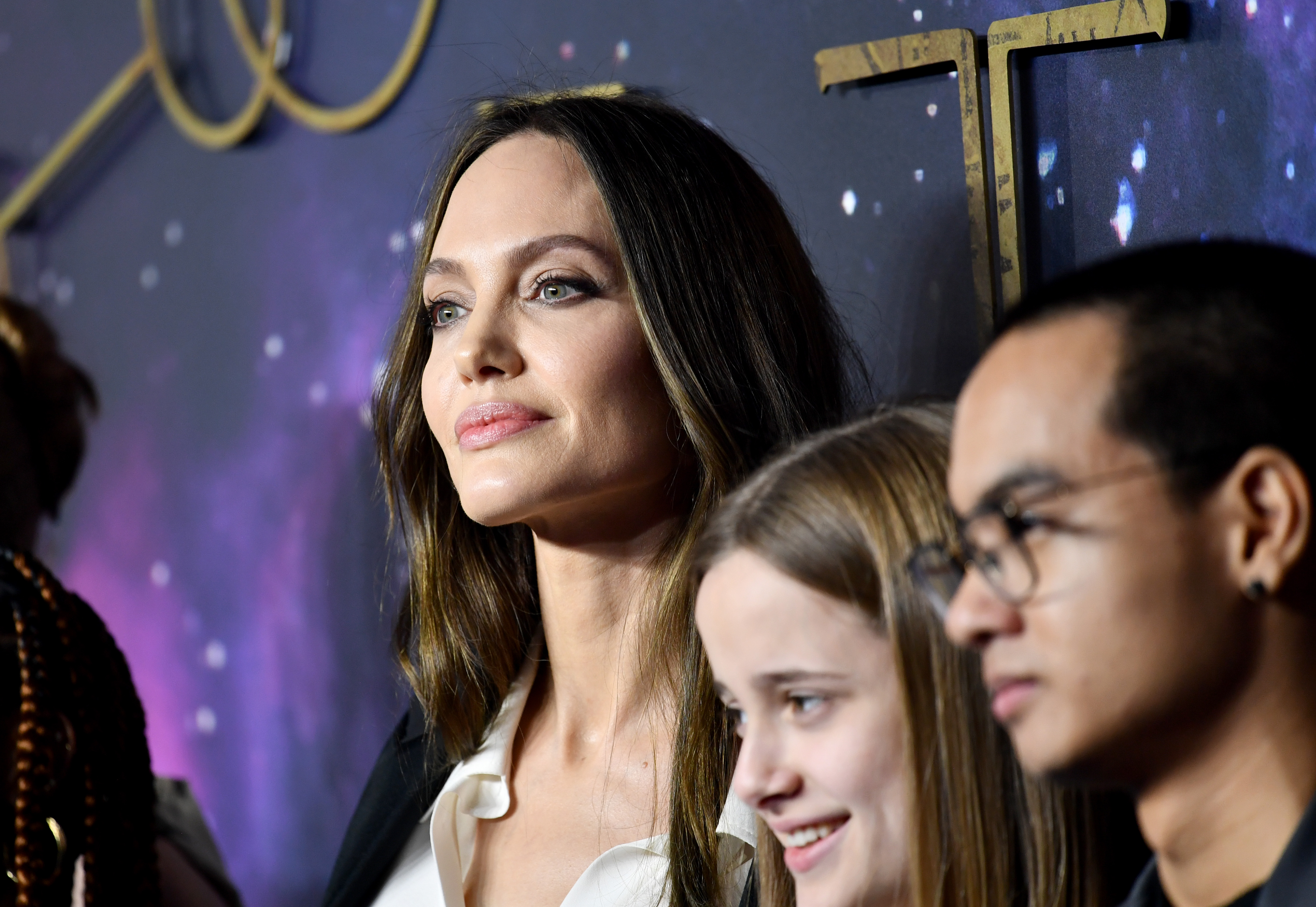 Angelina Jolie, Vivienne Jolie-Pitt and Maddox Jolie-Pitt at the UK Gala screening of Marvel Studios' "Eternals" at BFI IMAX Waterloo on October 27, 2021 in London, England | Source: Getty Images