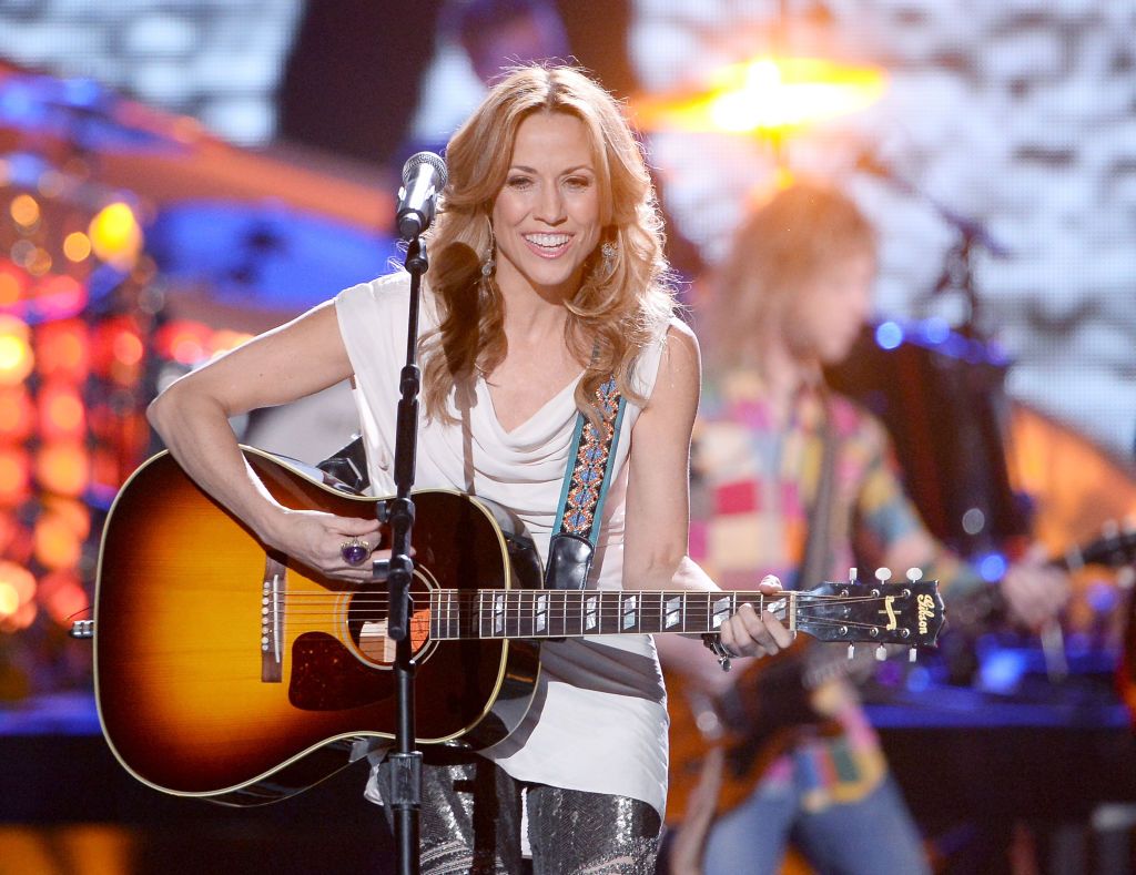 Sheryl Crow performs onstage during the American Country Awards 2013 at the Mandalay Bay Events Center on December 10, 2013