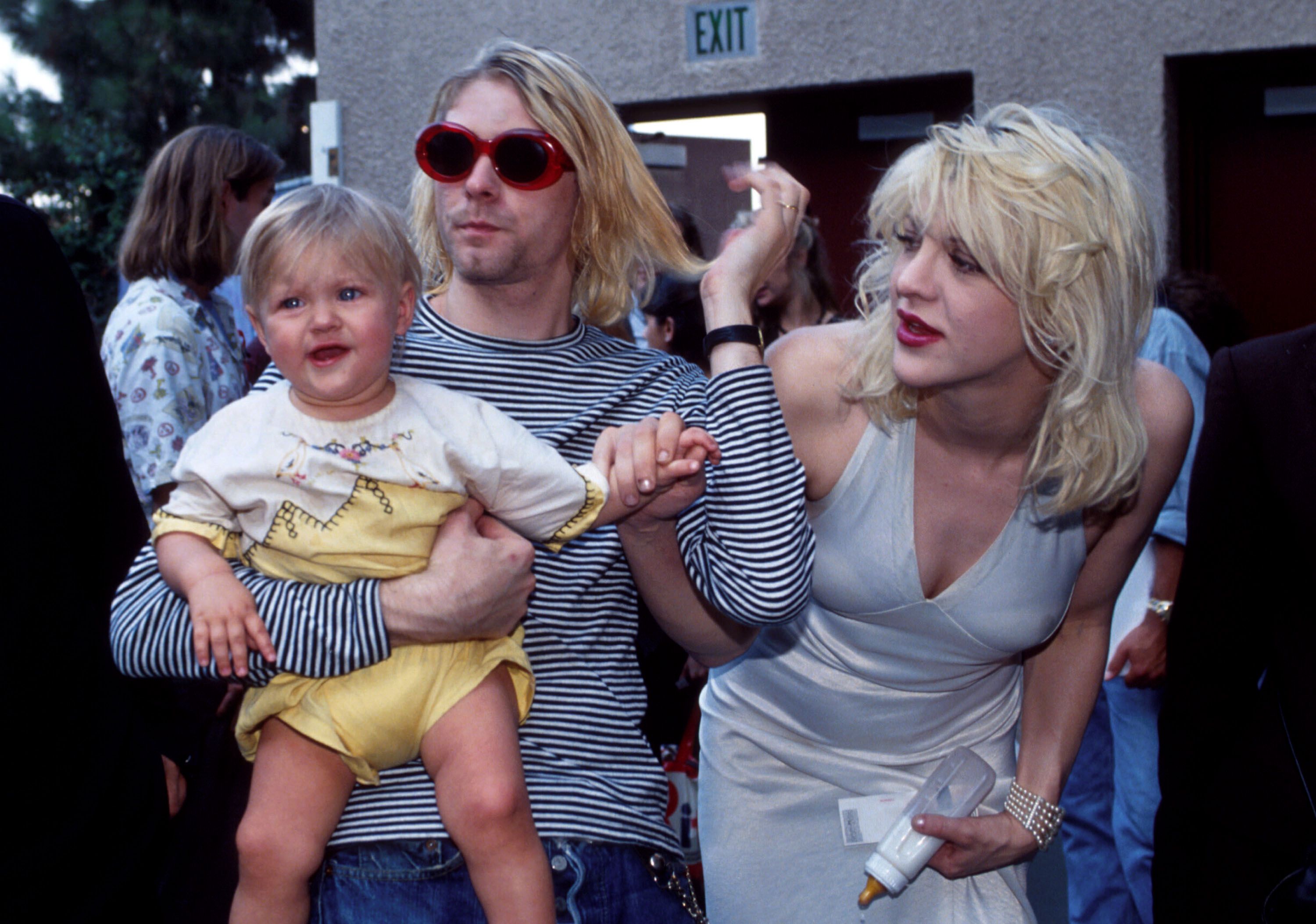 Kurt Cobain of Nirvana with Courtney Love and daughter Frances Bean Cobain at the MTV Video Music Awards  in 1993 in Universal City, California | Source: Getty Images