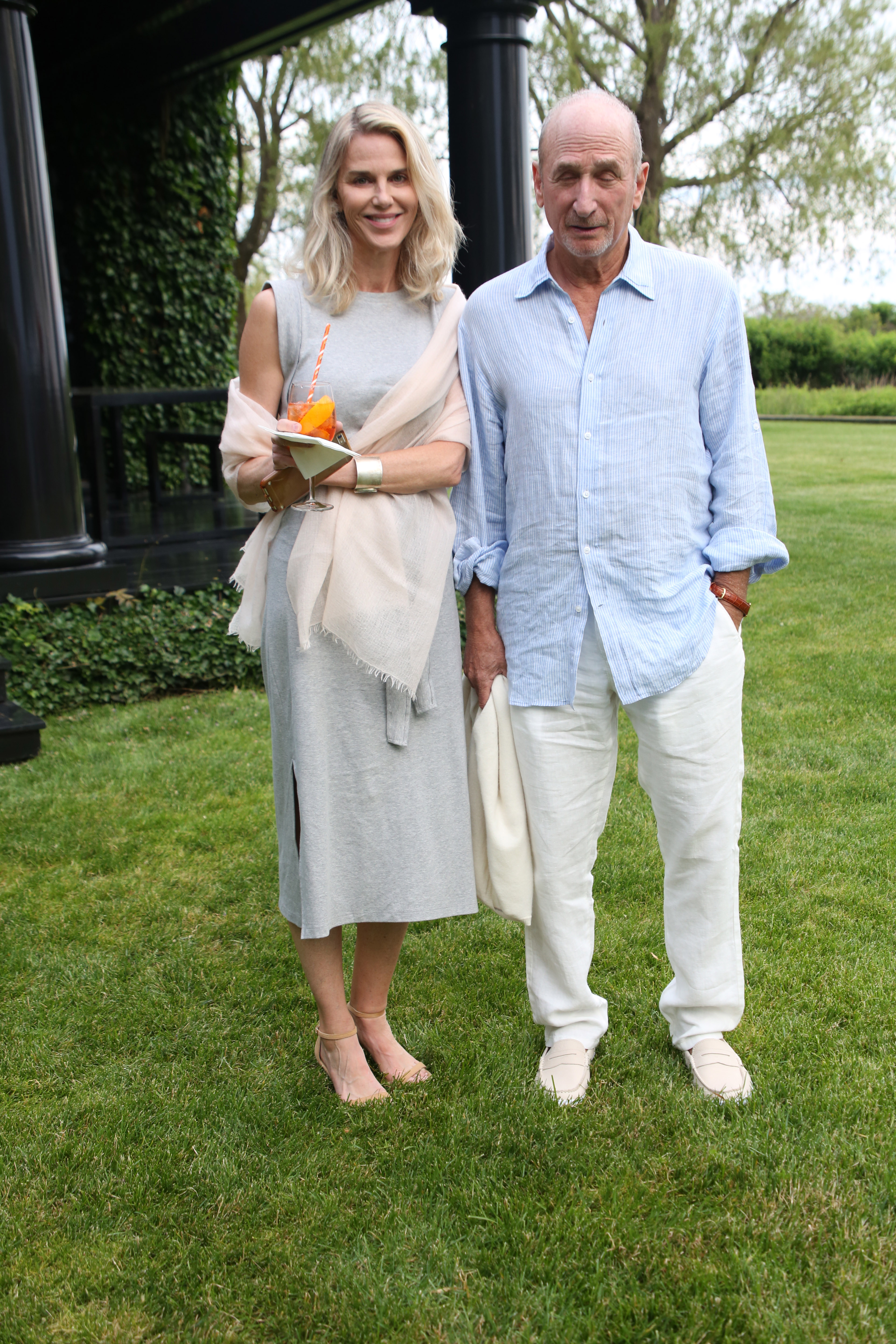 Kristin Kehrberg and Dick Tarlow at the Midsummer Night Drinks event to benefit God's Love We Deliver on June 9, 2018, in Watermill, New York | Source: Getty Images