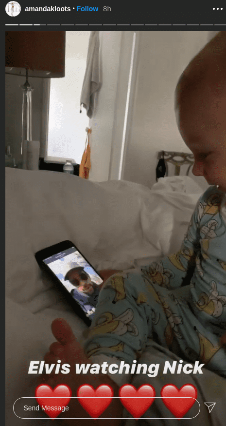 Elvis Cordero watching a video of his late father Nick Cordero on July 9, 2020 | Photo: Instgram Story/amandakloots