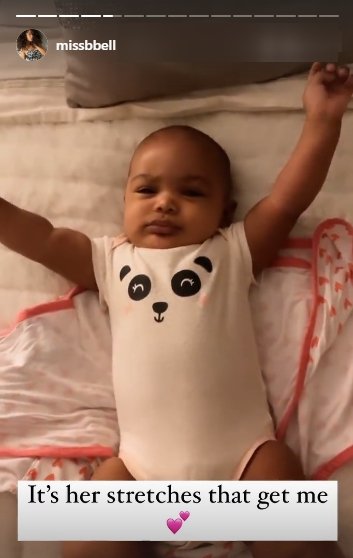 Brittany Bell shares a picture of her daughter stretching in bed. | Photo: Instagram/missbbell