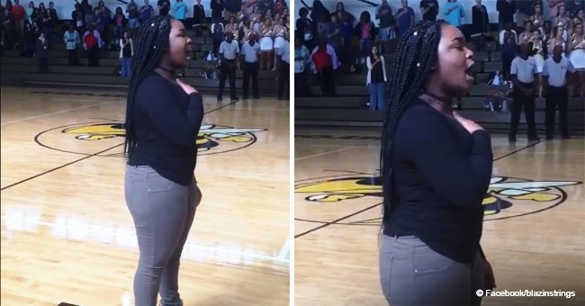 Girl's powerful performance of the national anthem without a mic that silenced the basketball court
