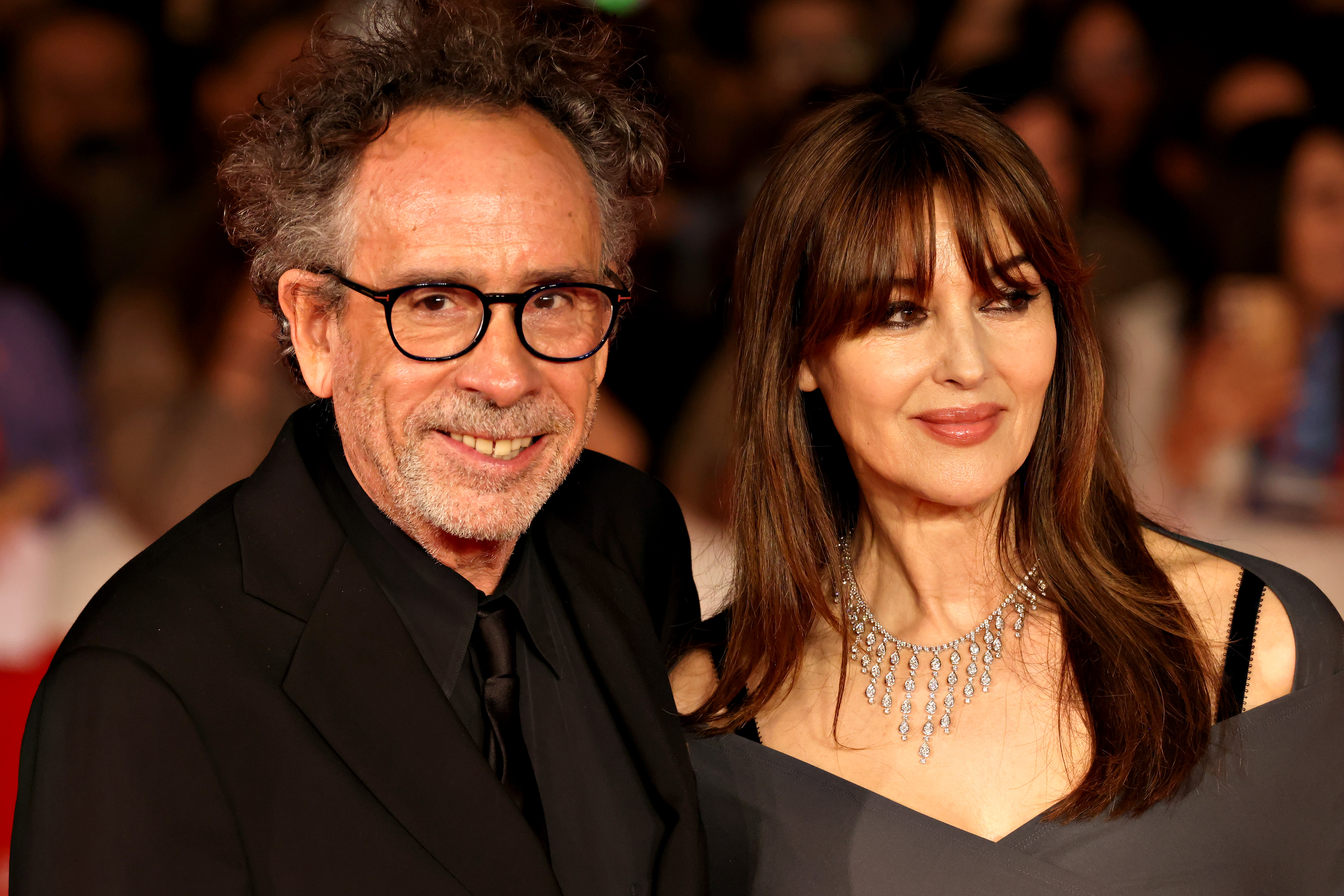 Tim Burton and Monica Bellucci at a red carpet for the movie "Diabolik Chi Sei?" in Rome, Italy on October 19, 2023 | Source: Getty Images