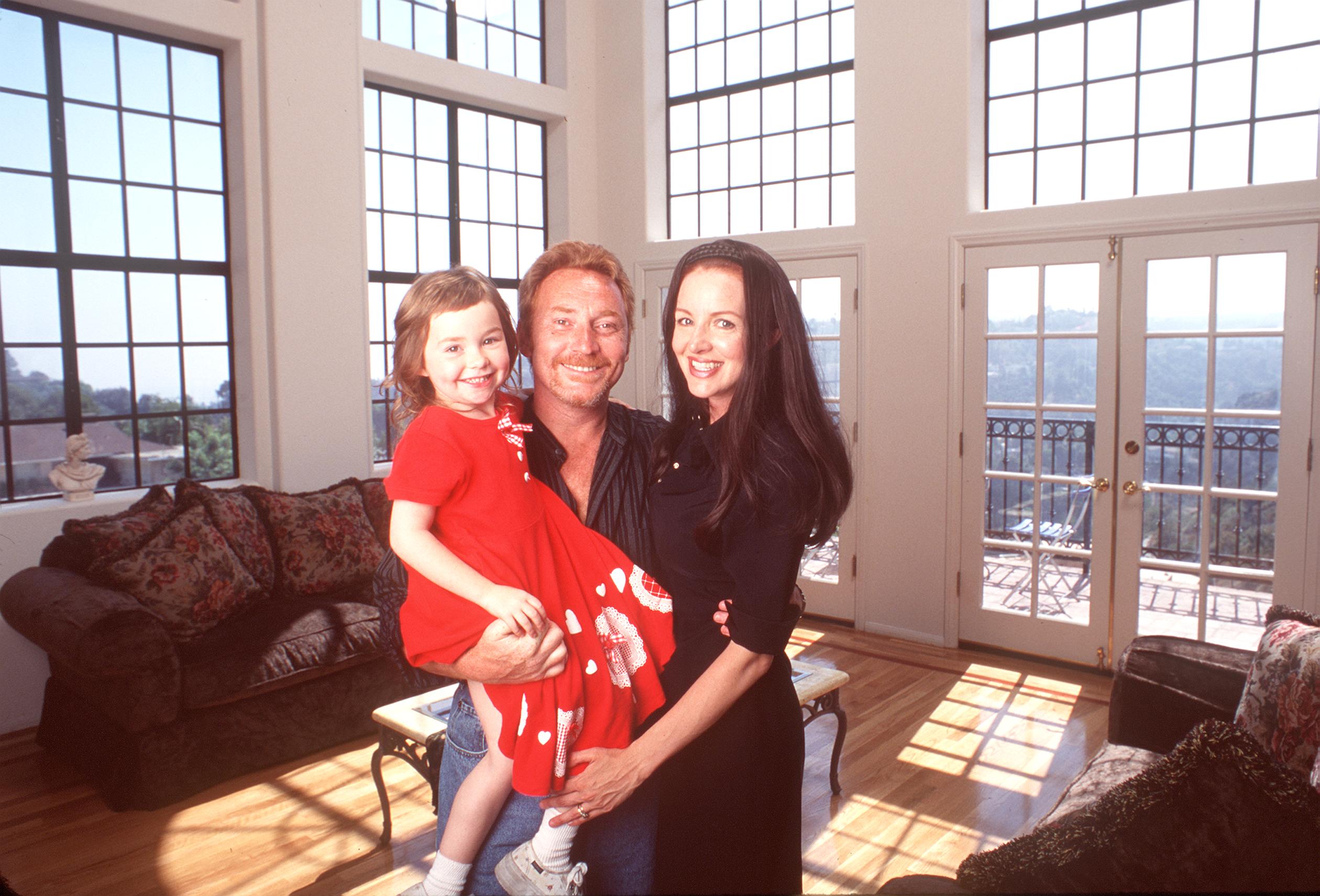 Former "Partridge Family" child star, Danny Bonaduce with his wife, Hillmer and daughter, Isabella at their new Hollywood Hills home. | Source: Getty Images