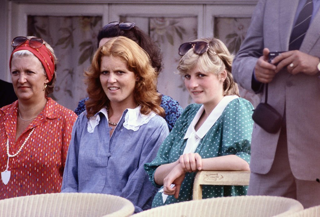 Diana Princess of Wales with Sarah Ferguson (later the Duchess of York) watches Prince Charles playing polo at Guards Polo Club on Smiths Lawn in June 1982 in Windsor, Berkshire. | Photo: GettyImages