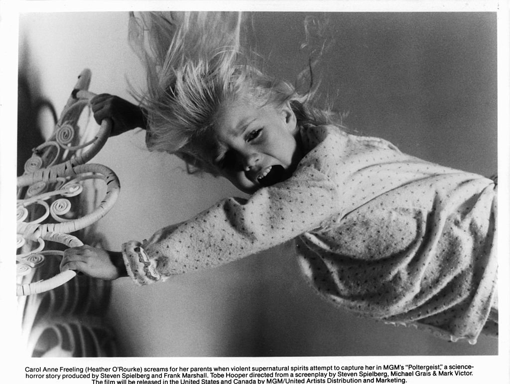 Evils spirits attempted to capture Heather O'Rourke in a scene from the film "Poltergeist," 1982 | Photo: Getty Images