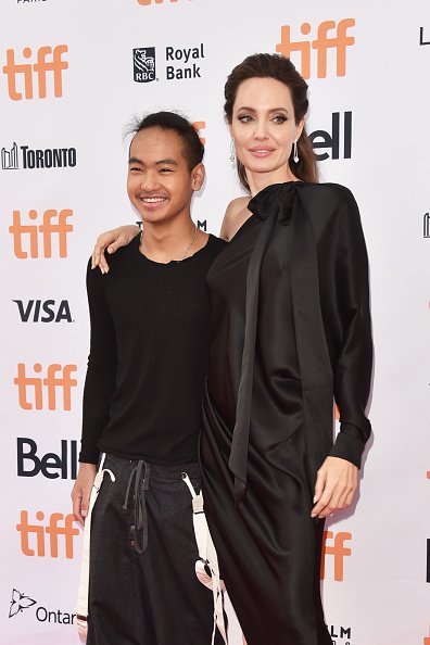 Maddox Jolie-Pitt and Angelina Jolie at Princess of Wales Theatre on September 11, 2017 in Toronto, Canada. | Photo: Getty Images