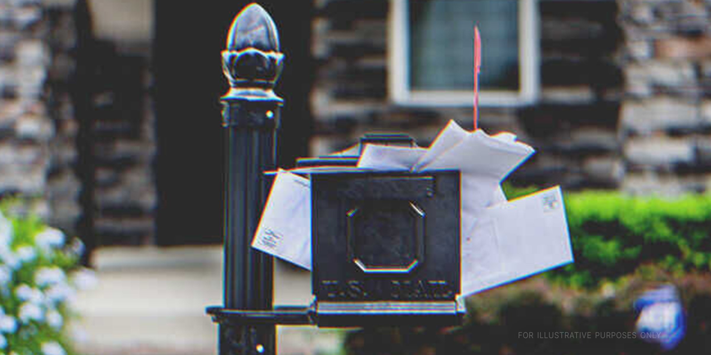 Mailbox overflowing with letters. | Source: Shutterstock