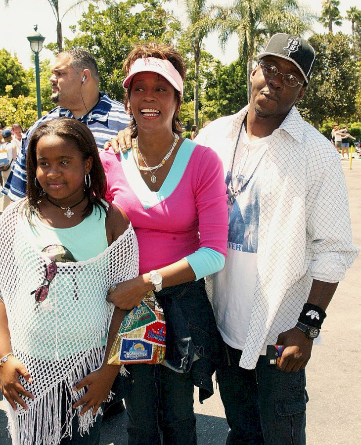 Whitney Houston, Bobby Brown and Bobbi Kristina at the premiere of "The Princess Diaries 2: Royal Engagement" at Disneyland on August 7, 2004 | Photo by Frederick M. Brown/Getty Images