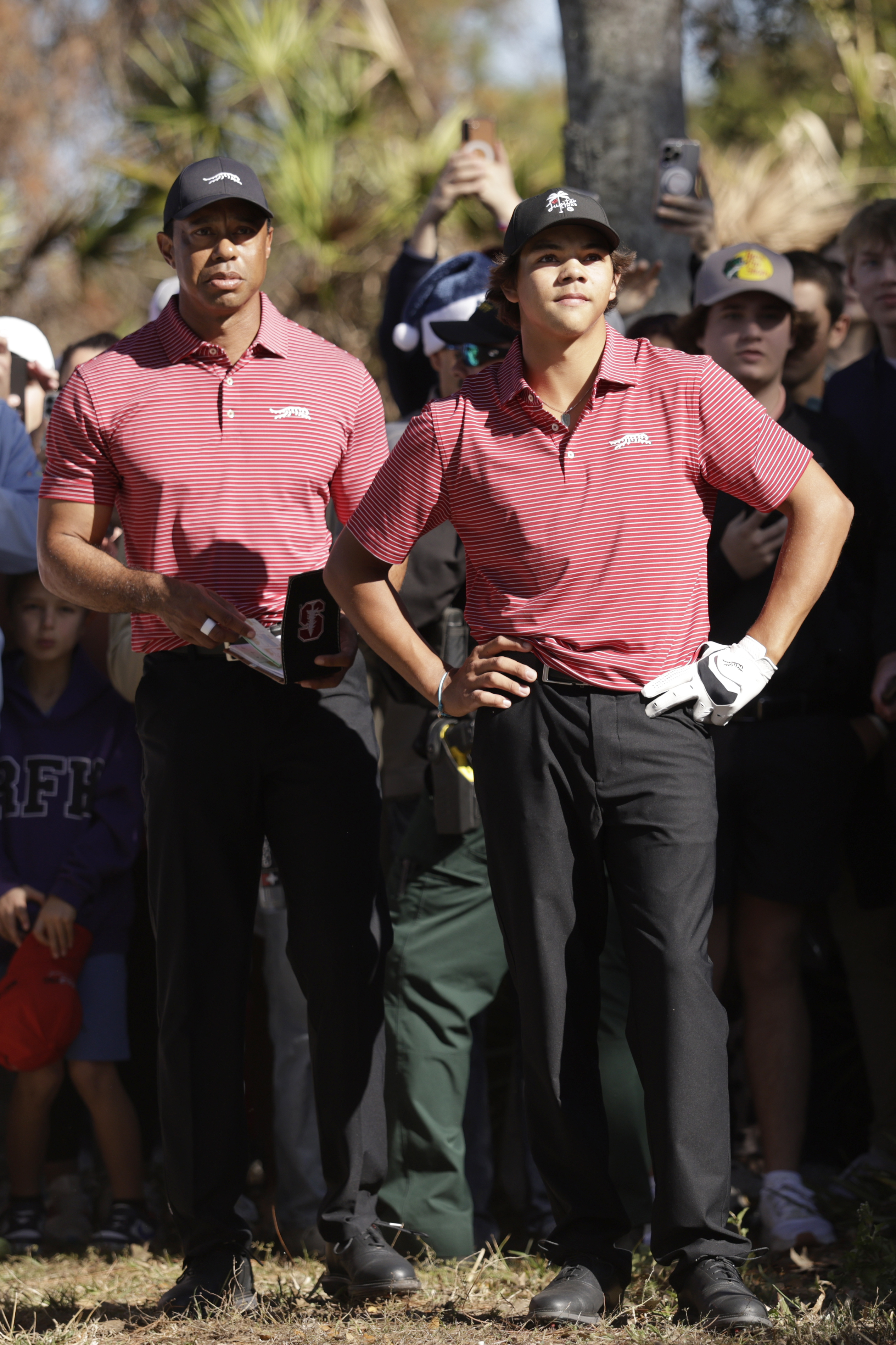 Tiger Woods and Charlie Woods on December 22, 2024, in Orlando, Florida | Source: Getty Images