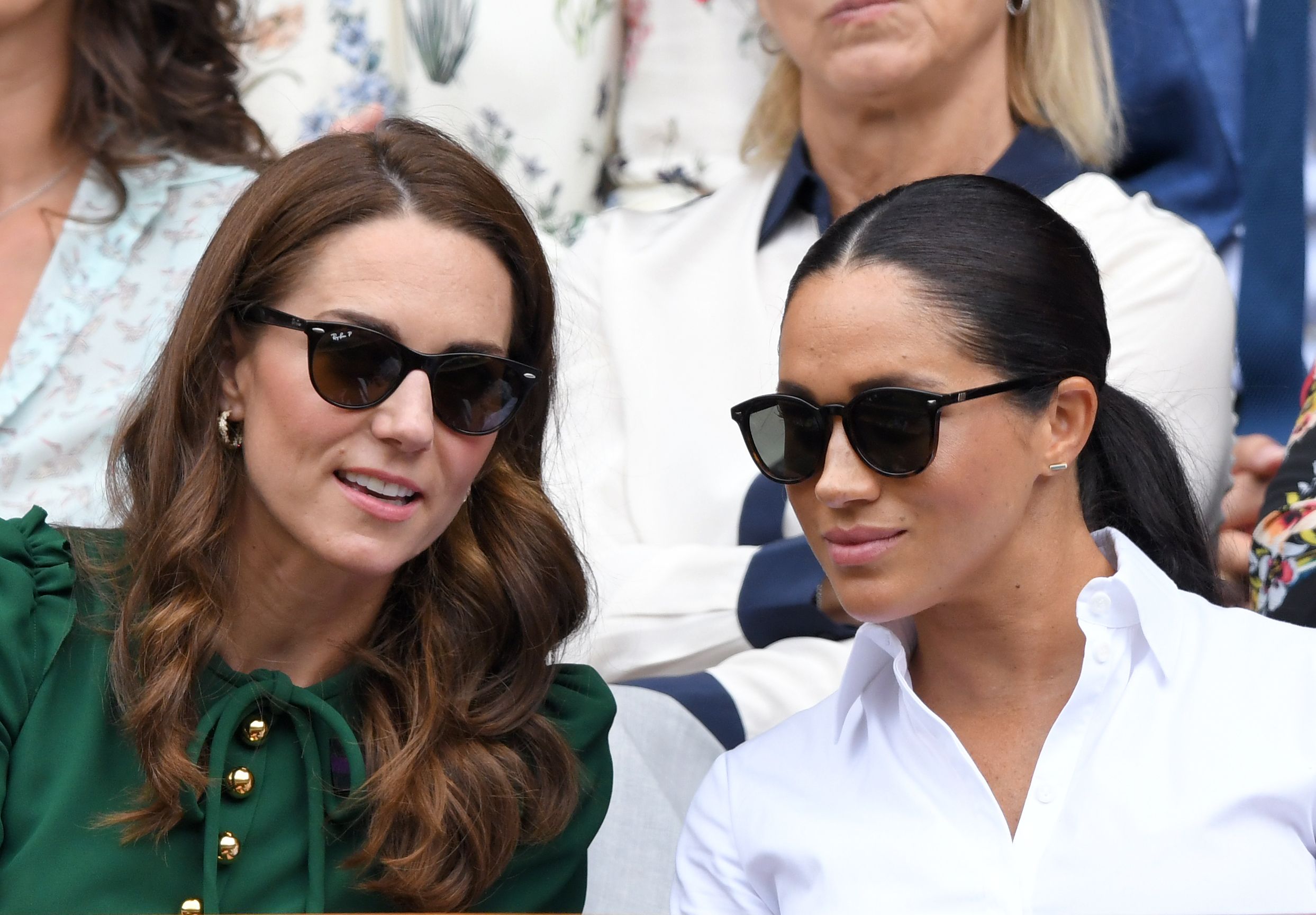Kate Middleton and Meghan Markle in the Royal Box on Centre Court during day twelve of the Wimbledon Tennis Championships at All England Lawn Tennis and Croquet Club on July 13, 2019 | Photo: Getty Images