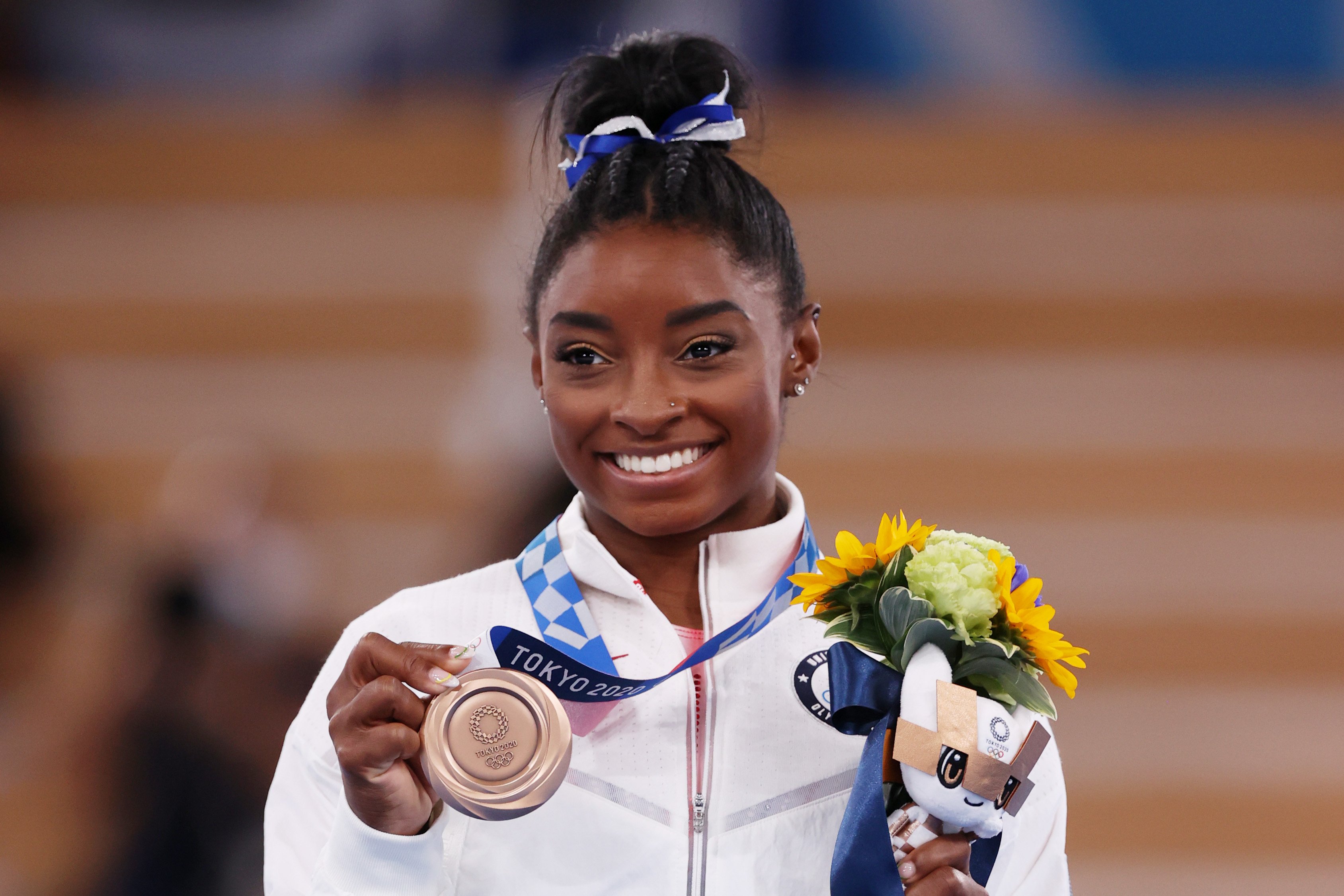 Simone Biles pictured with a bronze medal during the Women's Balance Beam Final medal ceremony in Tokyo 2020 Olympics on August 3, 2021 in Tokyo, Japan. | Photo: Getty Images