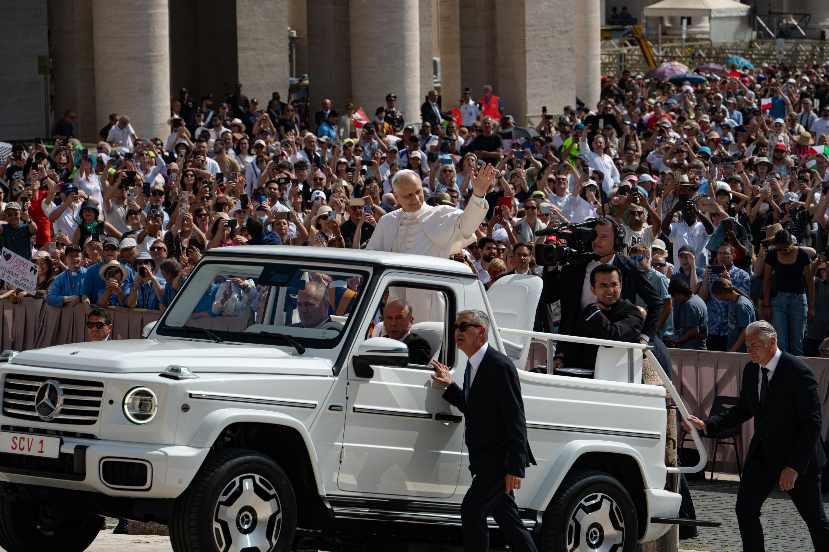 Pope Leo XIV waves to a large crowd from his popemobile as he arrives at St. Peter's Square for his weekly general audience in Vatican City on June 11, 2025 | Source: Getty Images