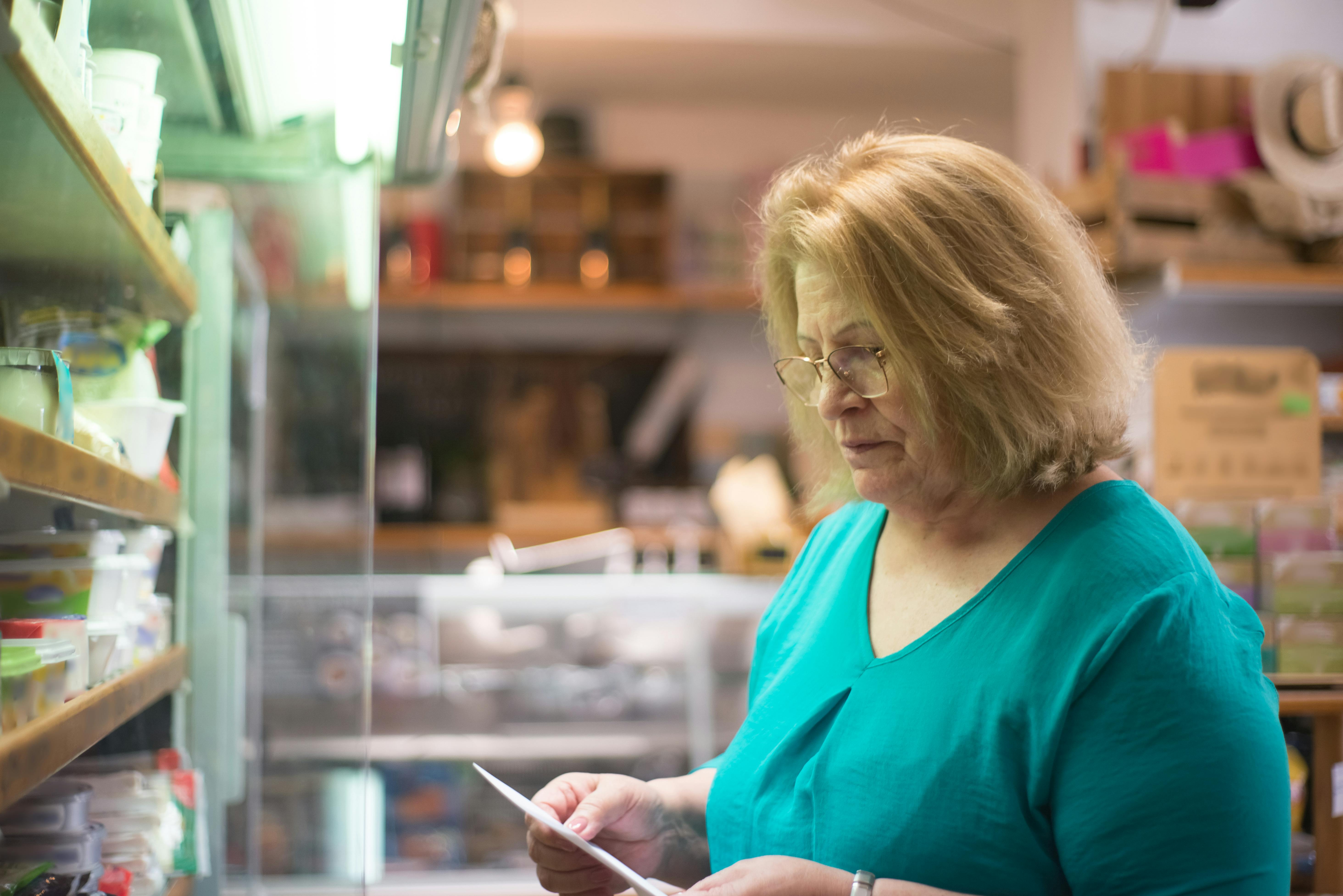 A woman reading a list | Source: Pexels