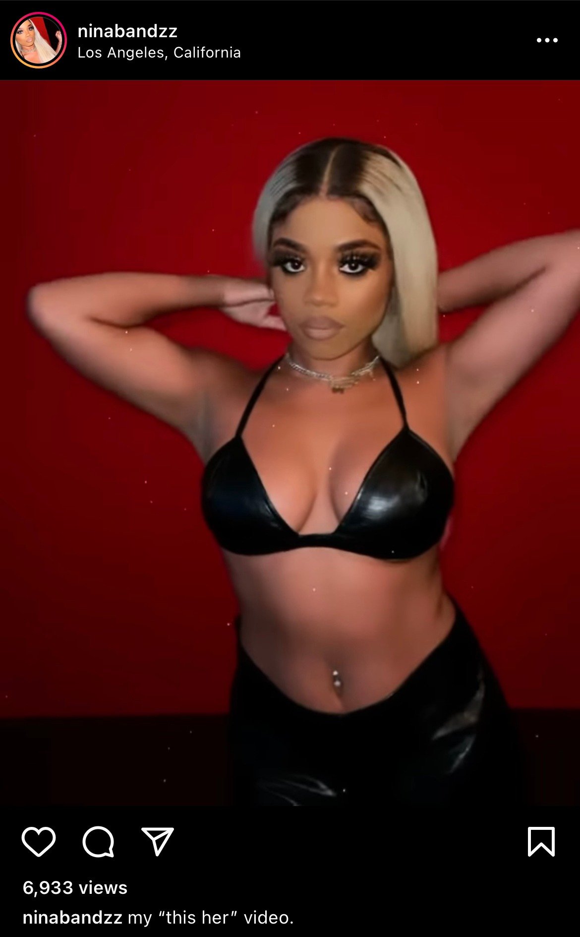 A clip of Nina-Symone Smith flaunts her sassiness while wearing a black bra and showing her navel piercing. | Photo: instagram.com/ninabandzz