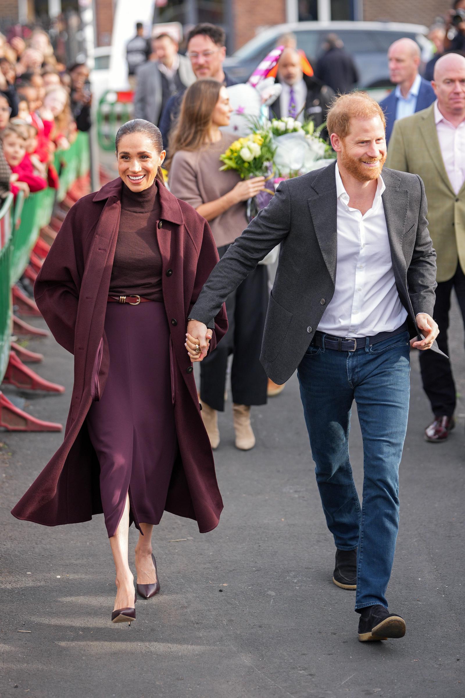 Meghan, Duchess of Sussex and Prince Harry, Duke of Sussex greet well-wishers as they arrive at the Community Recording Studio (CRS), a youth and community charity that offers a wide range of creative activities, sports, mentoring and youth development programmes, during the Duke and Duchess of Sussex's visit to Nottingham on October 15, 2026, in Nottingham, England. | Source: Getty Images