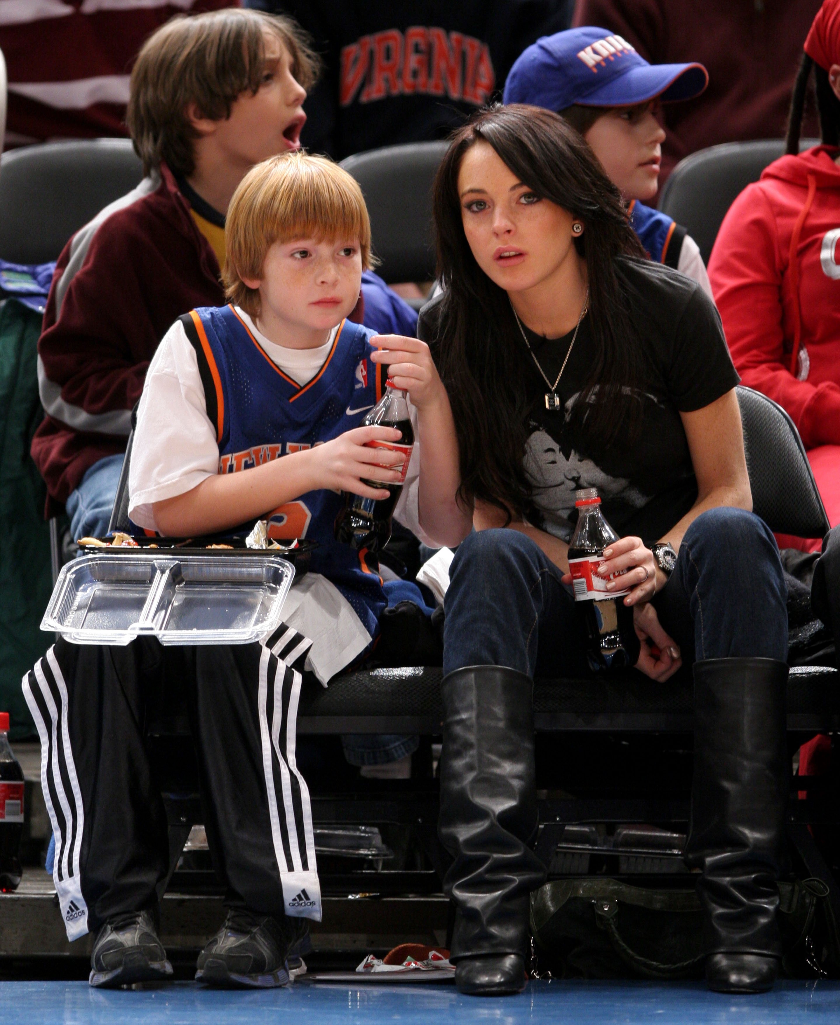 Dakota Lohan and Lindsay Lohan during Celebrities Attend the Utah Jazz vs New York Knicks Game - December 23, 2005, at Madison Square Garden in New York City, New York, United States. | Source: Getty Images