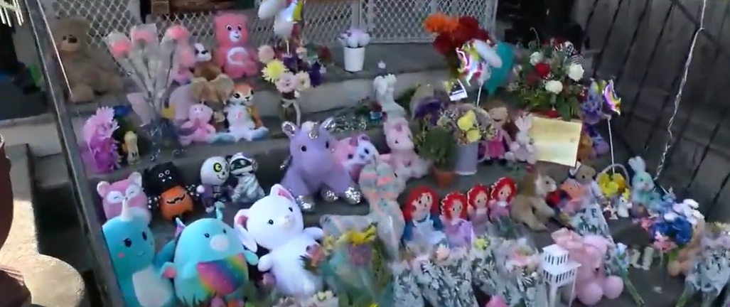 An impromptu memorial outside the familys home, as seen in a video dated September 20, 2024 | Source: YouTube/ABC21 WPTA