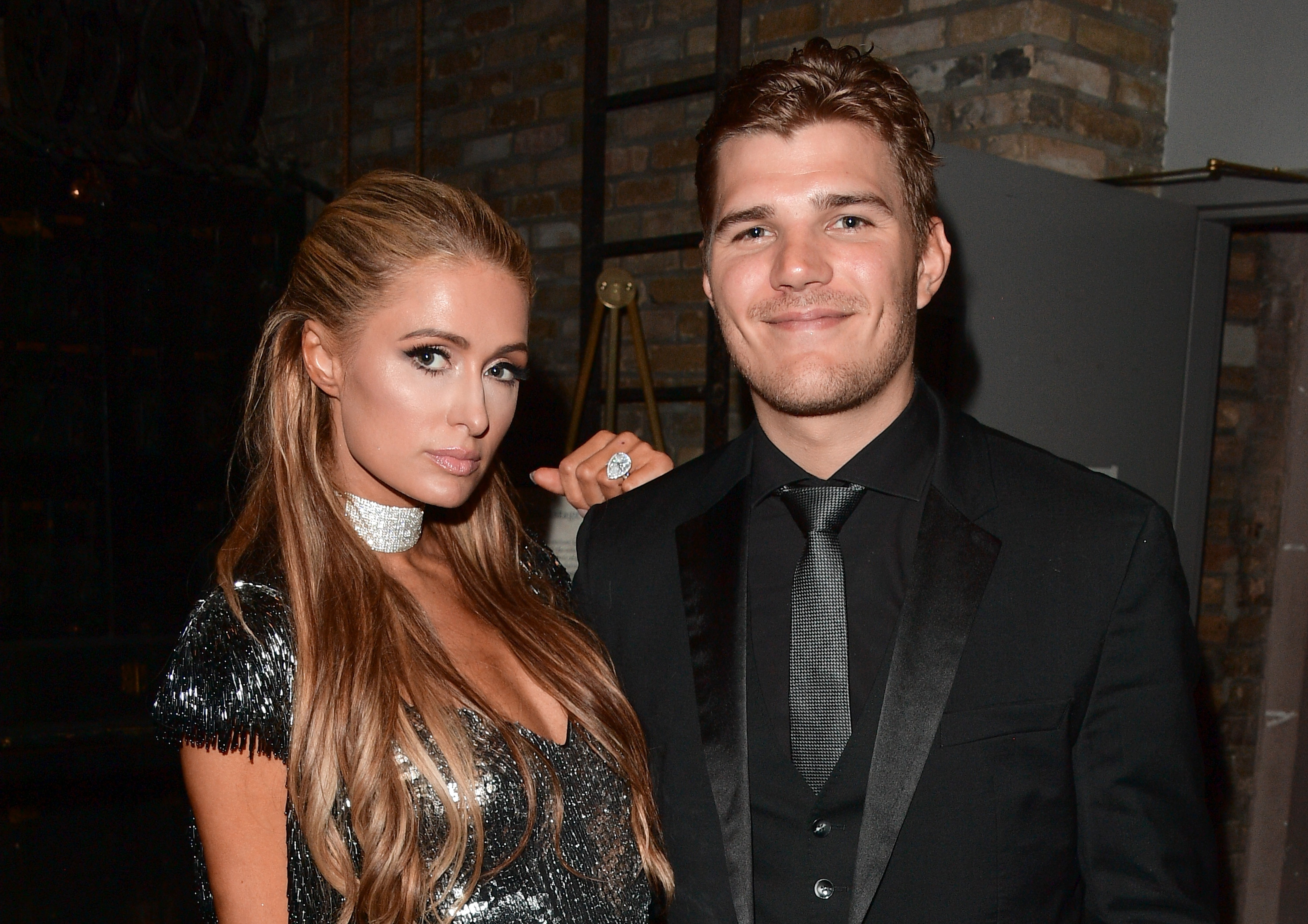 Paris Hilton (L) and Chris Zylka attend the "The Death And Life Of John F. Donovan" premiere during 2018 Toronto International Film Festival at Winter Garden Theatre on September 10, 2018 in Toronto, Canada | Source: Getty Images 
