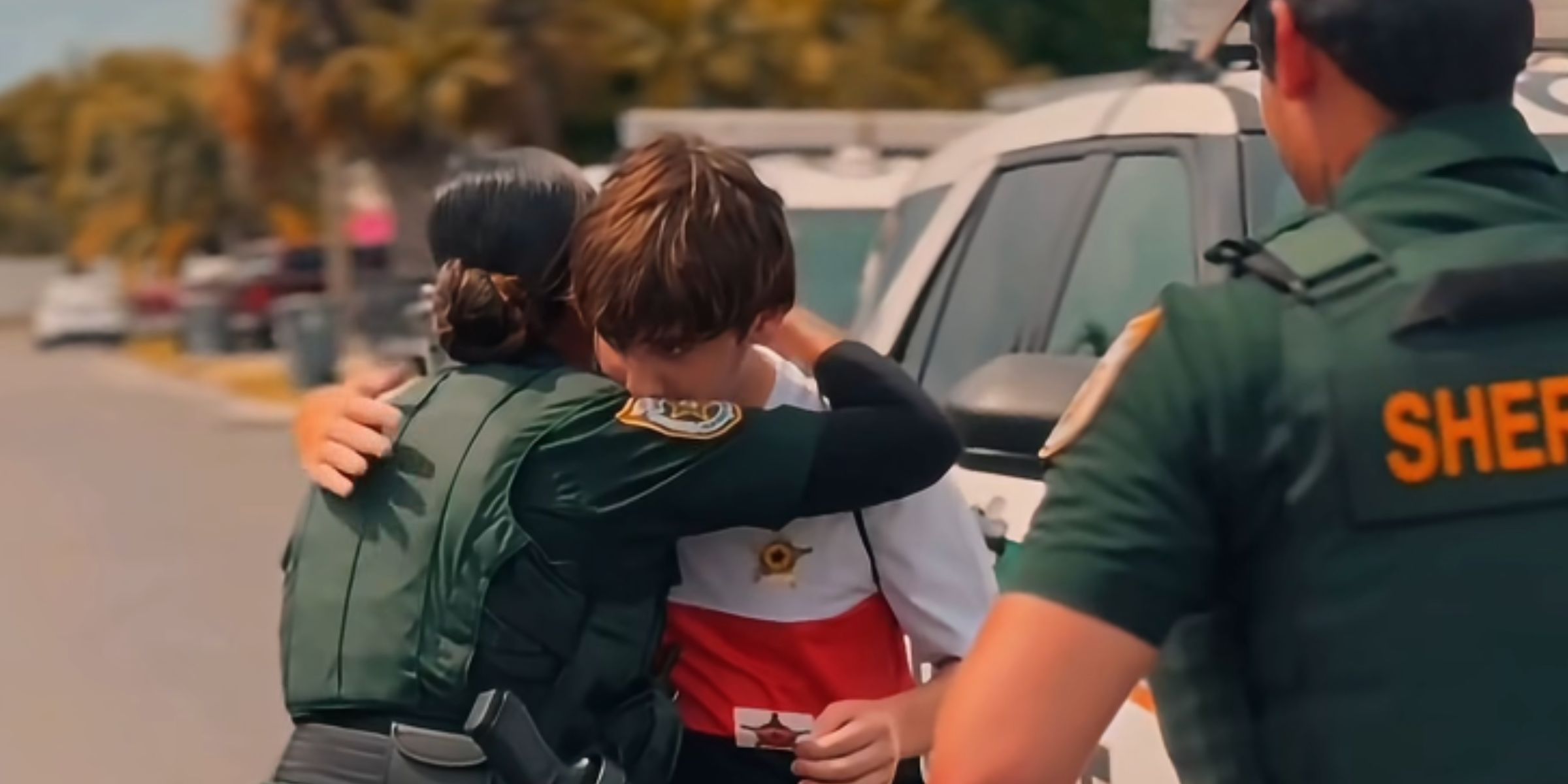 First responder giving boy who survived a lightning strike a hug | Source: Facebook/palmbeachcountysheriff'soffice