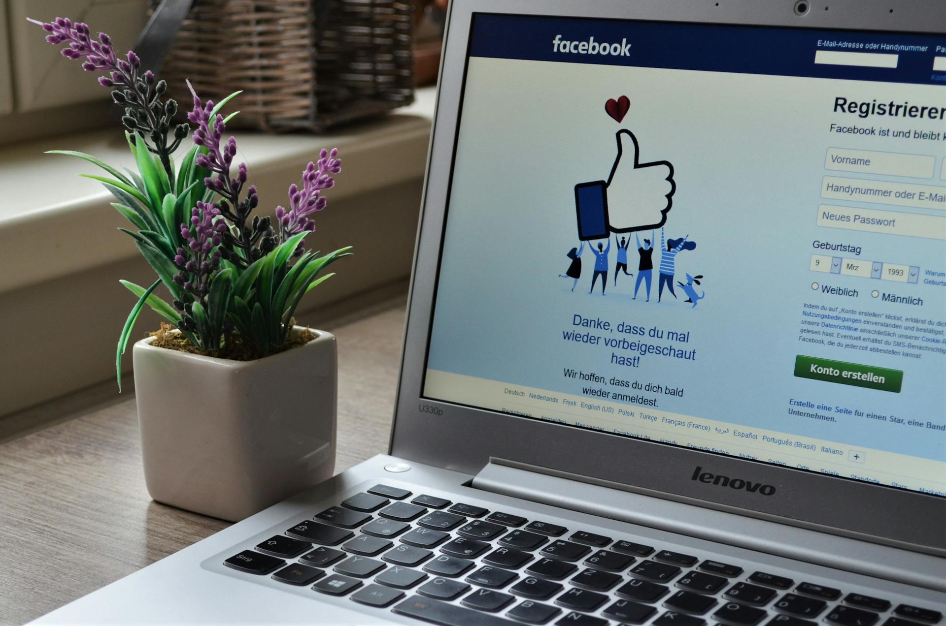Laptop opened to Facebook | Source: Pexels