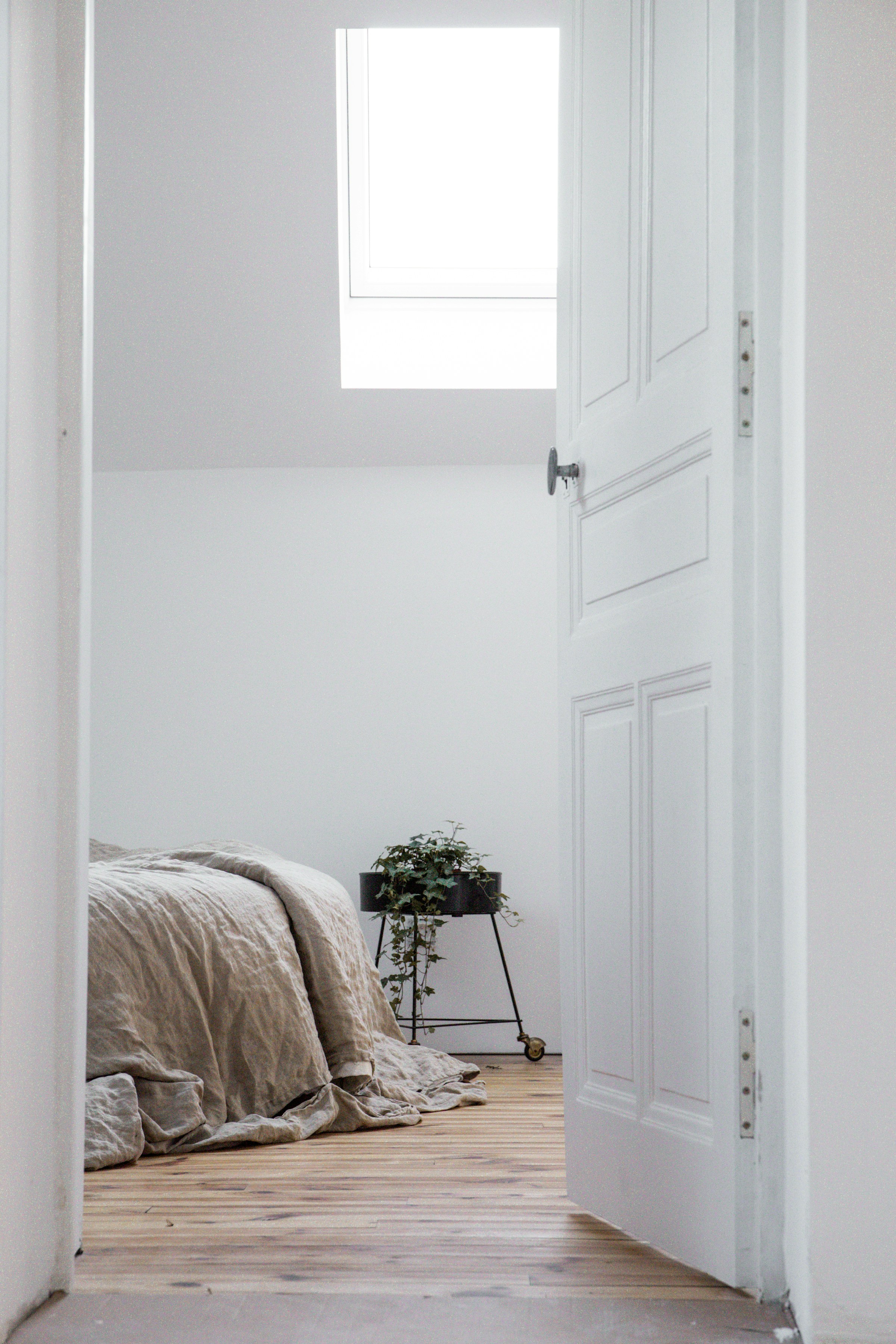 An opened bedroom door | Source: Unsplash